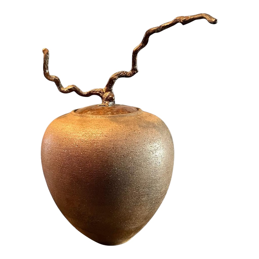 Late 20th Century Carol Green Studio Pottery Lidded Jar-Bronze Vine Finial-Art-Raku Clay-Wabi Sabi: Elegant studio pottery vessel signed "C Green" to the base. This is her contorted filbert design. These wheel-thrown mica clay vessels are unglazed and raku fired. Satin, ember-brown surface and a
