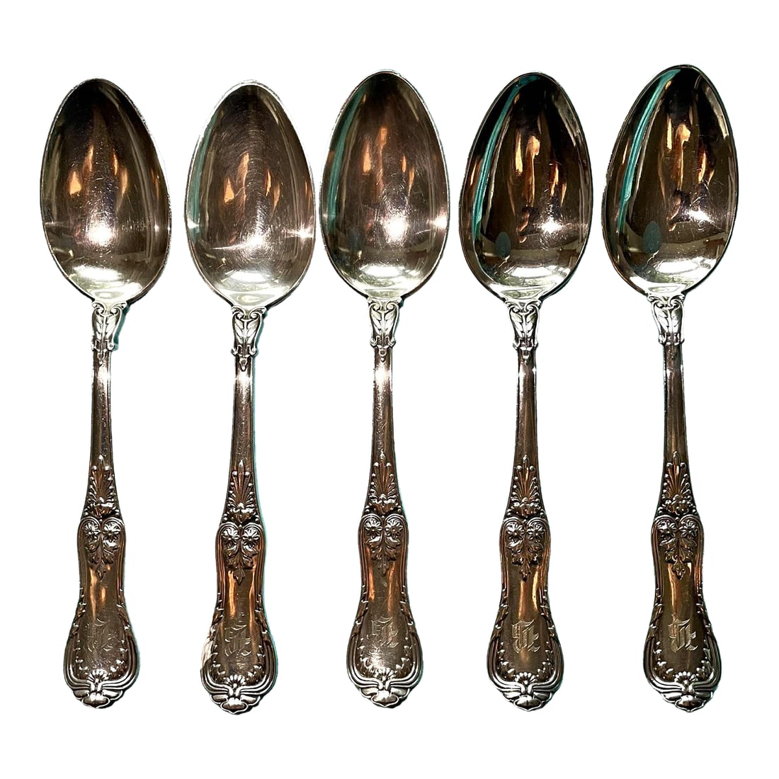 Tiffany & Company Set of 5 Serving Spoons 1884 Regent: Elevate your buffet table with this exquisite set of five silver serving spoons from Tiffany and Company. The highest quality silverplate "Regent" pattern dates from 1884 and is detailed on both sides