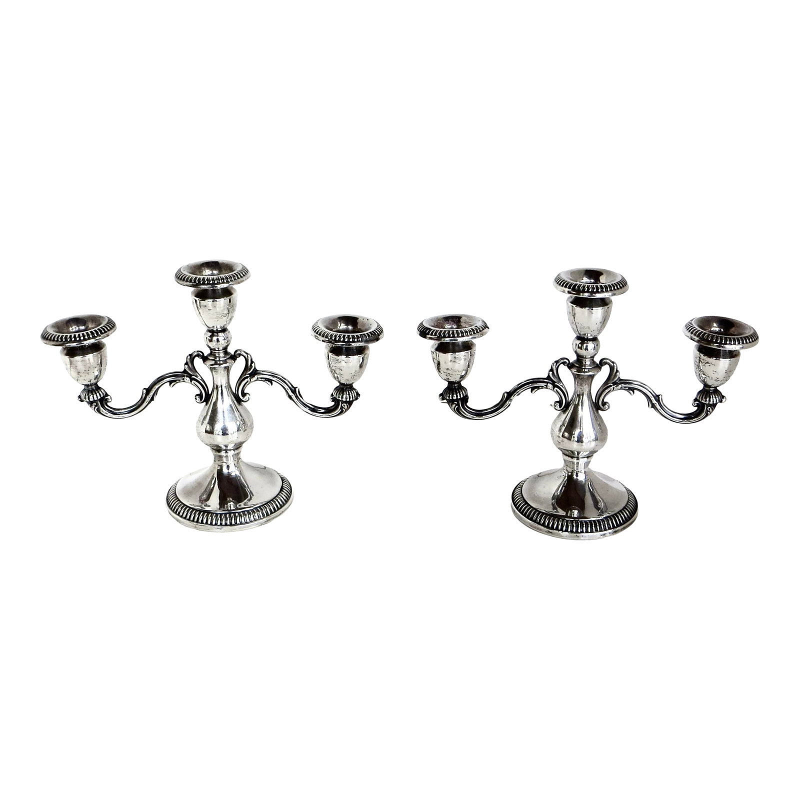 Early 20th C Pair of Three Armed Sterling Silver Candlabras Circa 1910: Pair of early 20th century Art Nouveau sterling silver three armed candlabras in excellent and completely all original condition with all parts and elements intact, including drip trays. Branches exte