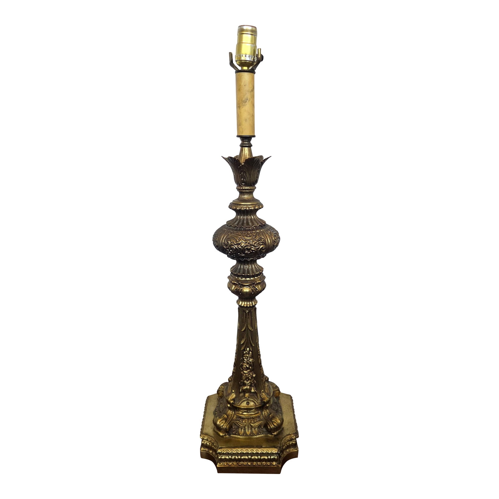 1950s Mid-Century Rococo Revival Solid Brass Table Lamp: Description This richly detailed brass table lamp brings Old World elegance to any interior, offering a sculptural presence ideal for consoles, side tables, or layered traditional spaces. Its warm pat