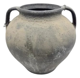 Vintage Moldovan Terracotta Vessel: A vintage terracotta vessel from Moldova is a handmade clay pot with a simple, rustic charm. These vessels can have two handles, a single handle, or no handles at all, depending on how they were