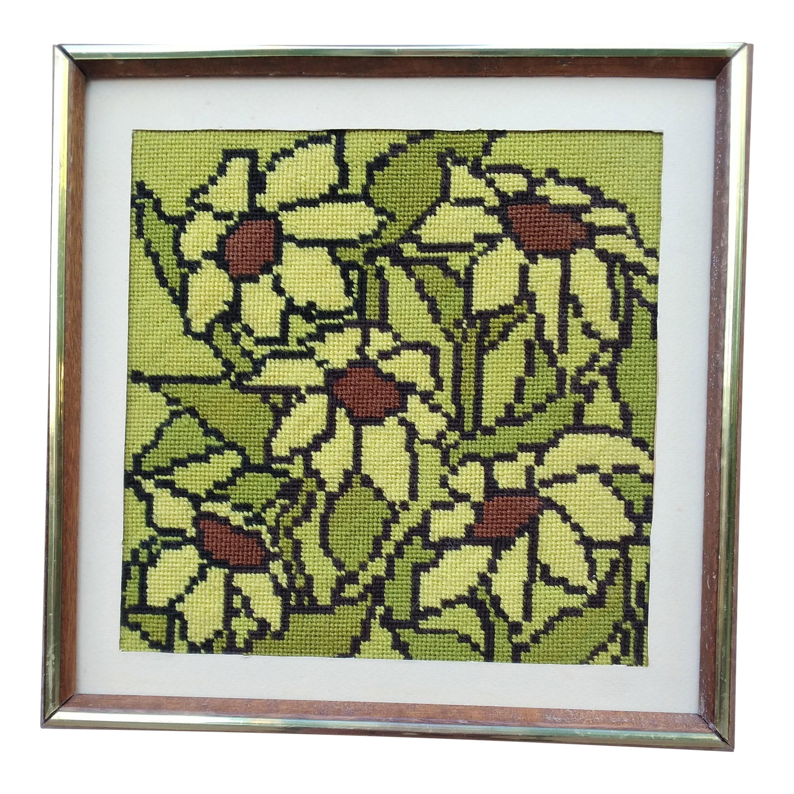 1970s Yellow and Green Stylized Floral Framed Needlepoint Picture: This vintage stylized floral needlepoint picture is screaming 1970s, the "flower power" era, with its avocado green, yellow, and brown hues. The needlepoint depicts five yellow flowers with brown