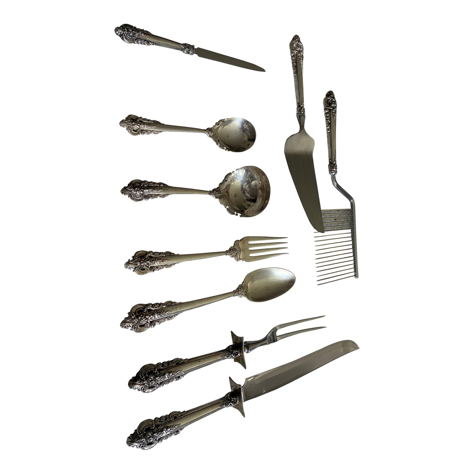 Wallace Grand Baroque Sterling Silver Serving Pieces - Set of 9 (New Letter Opener Added): There are 8 serving pieces in this group. They include, cake breaker, pie cutter, ladle, sugar spoon, serving fork, serving spoon, carving knife and carving fork. The 9th, newly added piece, is a