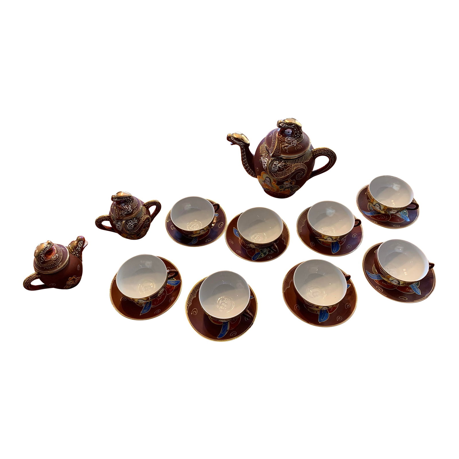 Mid 20th Century Japanese Dragonware Moriage Tea Set Kutani Lithophane Serves 8: Mid century Japanese Dragonware tea set. Includes teapot , sugar and cream with eight cup and saucers. In Kutani moriage style with lithophane Geisha. Condition: Alterations: Original Condition Unalte