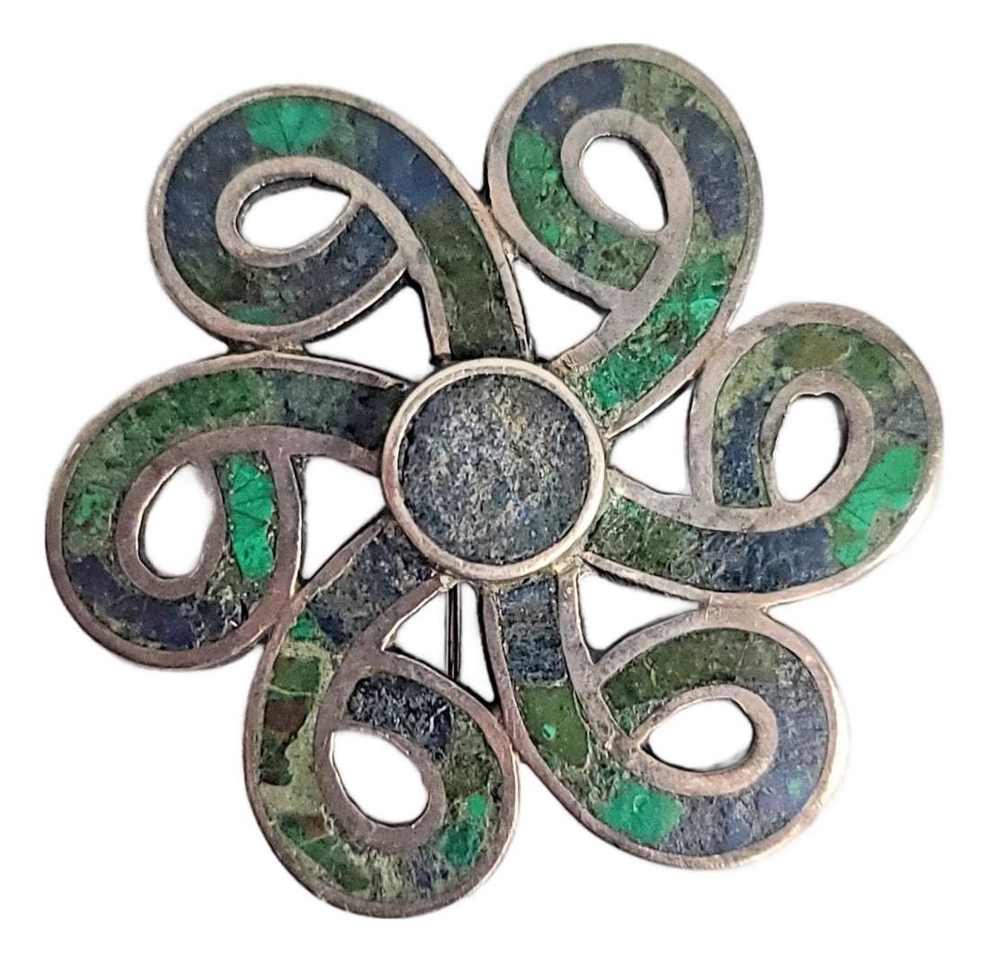 1970s Los Castillo Mexico Turquoise Malachite Lapis Swirl Sterling Brooch: This one-of-a-kind Los Castillo Mexico Turquoise Malachite Lapis Swirl Sterling Brooch is the eye-catching piece your vintage jewelry collection needs! This beautifully crafted brooch / pin inlays tur