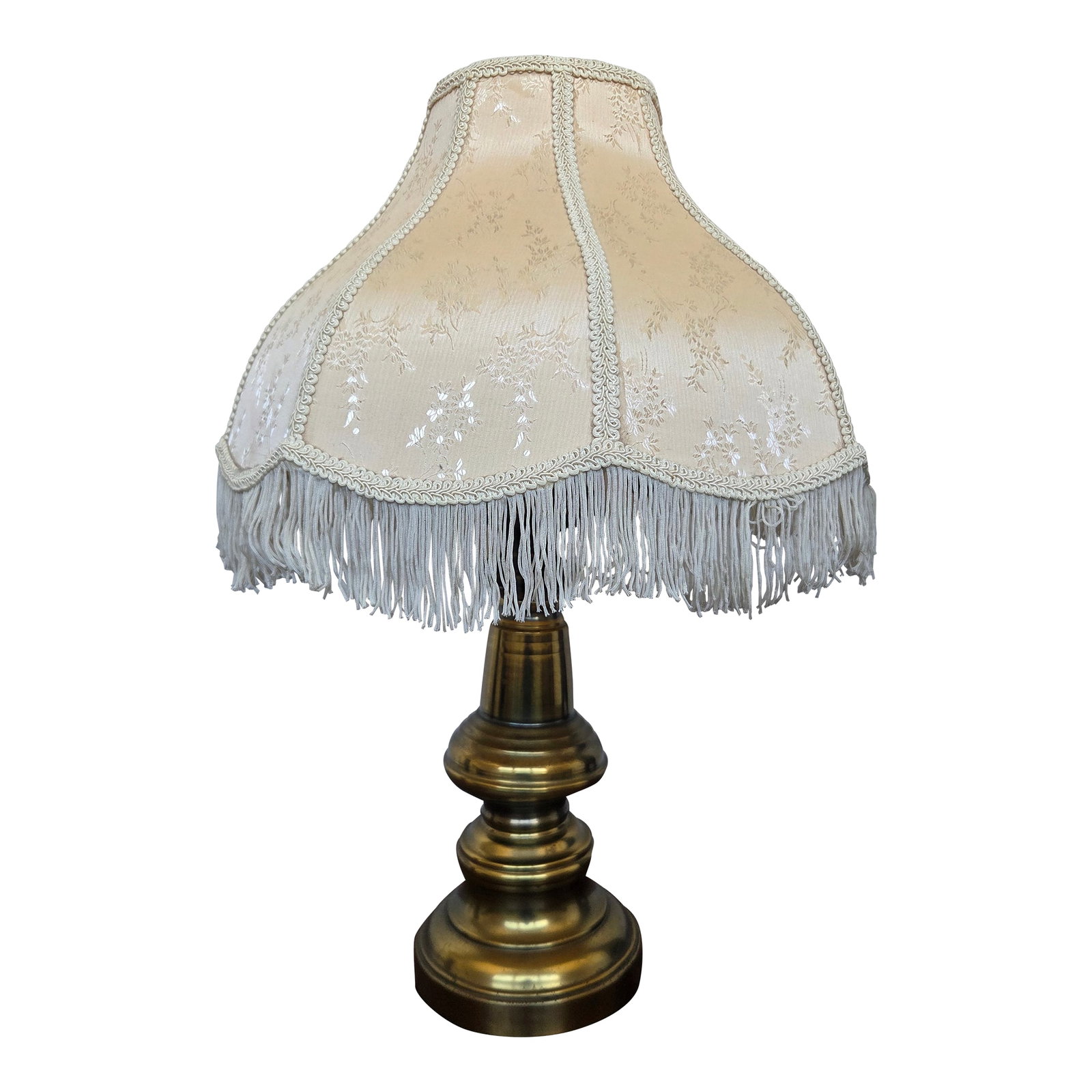 1940s Hollywood Regency Neoclassical Brass 3-Light Table Lamp W/ Fabric Fringe Shade: This elegant three-arm brass table lamp is a timeless example of mid-century traditional design, blending Hollywood Regency glamour with neoclassical formality. The balanced silhouette, scrolling