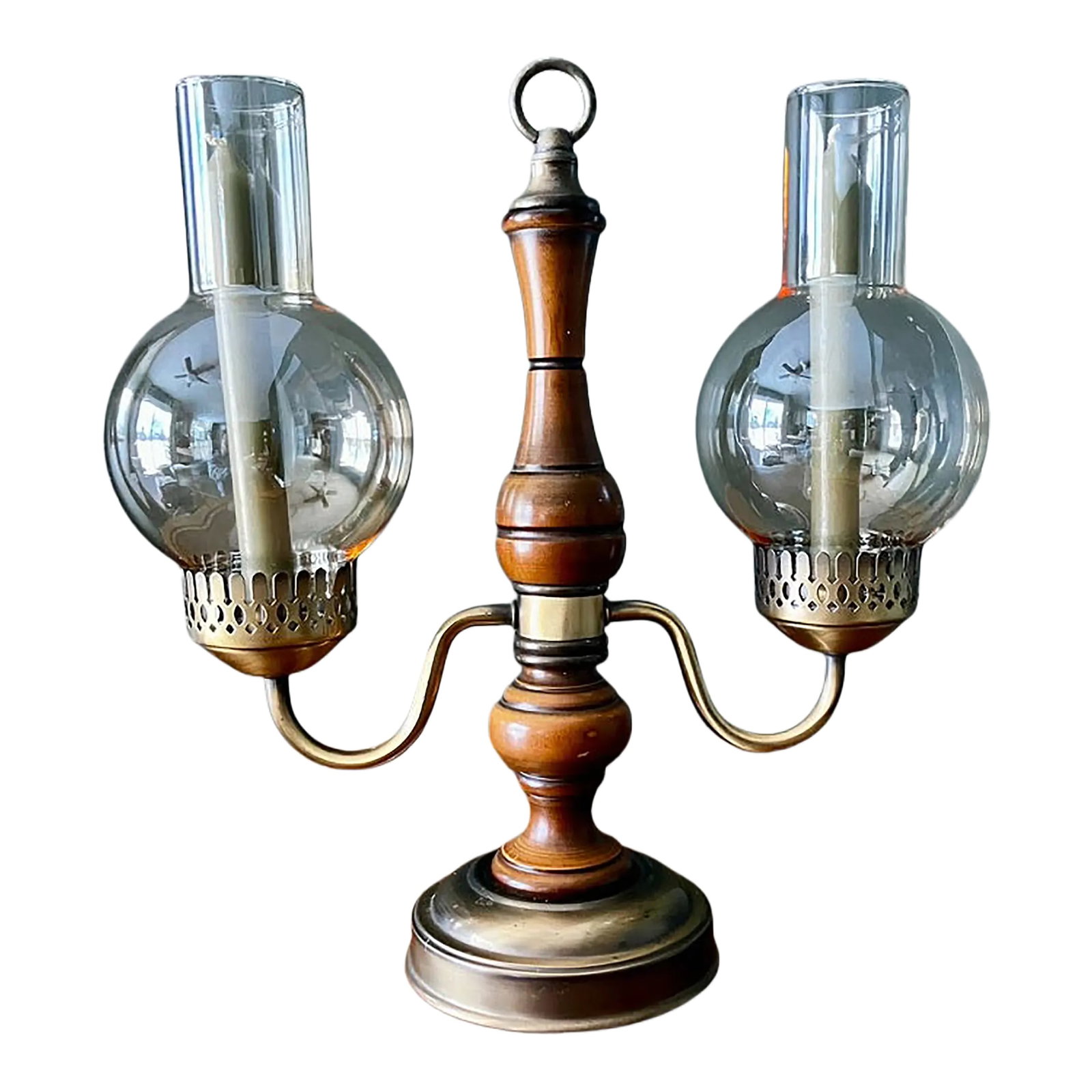 Vintage Brass and Wood Candelabra With Two Hurricane Glass Shades: This is a vintage brass and wood double hurricane lamp, also commonly referred to as a candelabra lamp or student lamp. These pieces often feature a Colonial or Early American style, and some may