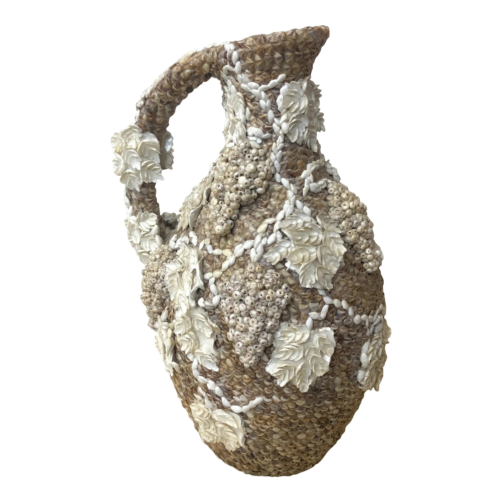 Early 20th Century Shell-Encrusted Pitcher With Grapevine Design: Extraordinarily detailed seashell encrusted ceramic pitcher with a grapevine design made of shells including seed shell. The entire exterior is covered in shells, including the bottom. Condition: