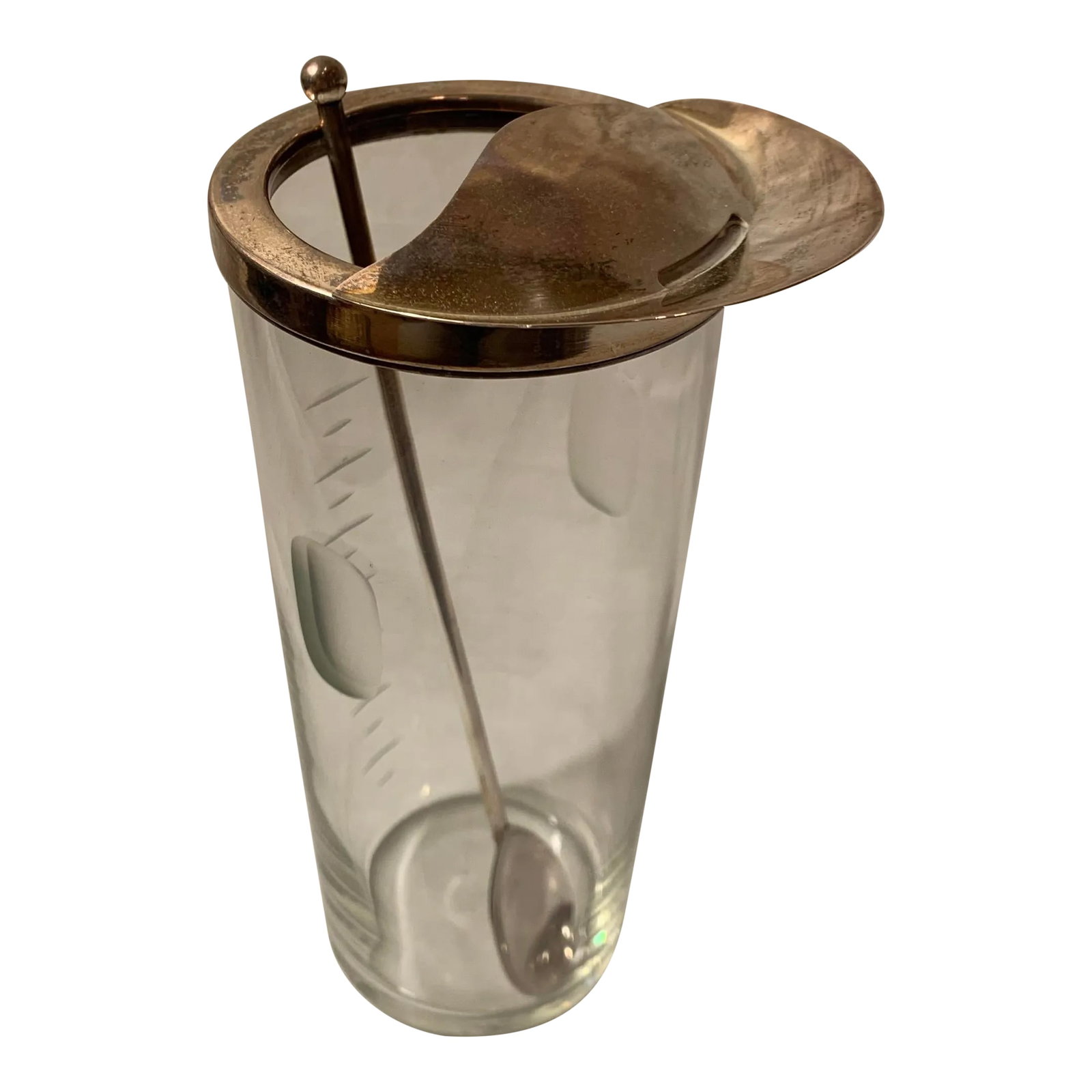 1930s Vintage Glass Cocktail Pitcher: 1930s glass cocktail pitcher with silver spout an etched glass detail with level and handle markings. Included is silverplate cocktail mixing spoon. Condition: Alterations: Original Condition Unaltere