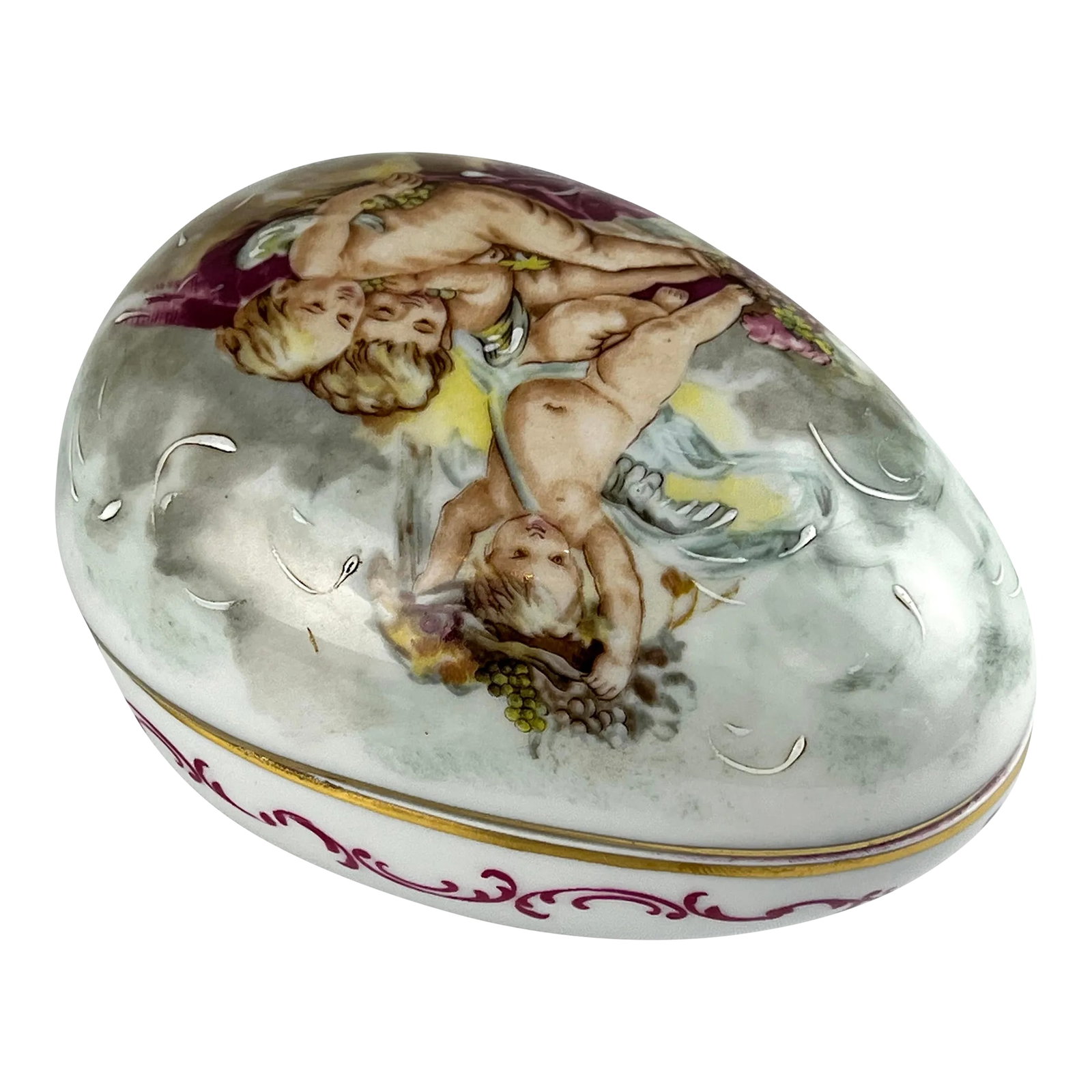 Late 20th Century Fontanille & Marraud Limoges Porcelain Easter Egg Box: An exceptionally large vintage Fontanille & Marraud Limoges porcelain egg box in the classic angels pattern. From top to bottom it measures 4.75 long x 3.5" wide x 1.5" high. In excellent vintage