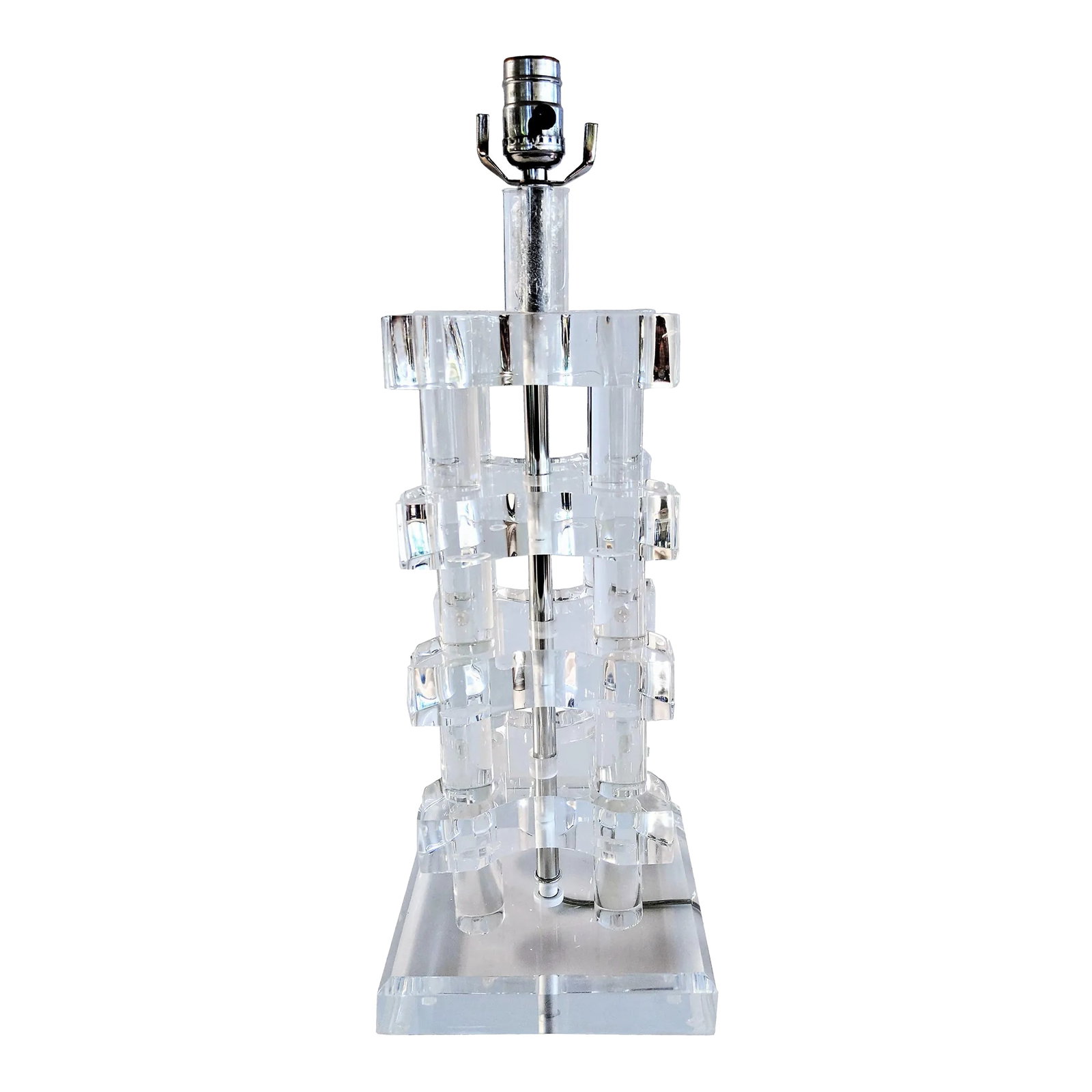 Vintage Mid-Century Modern Stacked Lucite Acrylic Table Lamp: Vintage Mid-Century Modern table lamp made of heavily stacked transparent Lucite pieces with chrome socket. This circa 1970s lamp makes a strong statement and bring you back to the era. Good