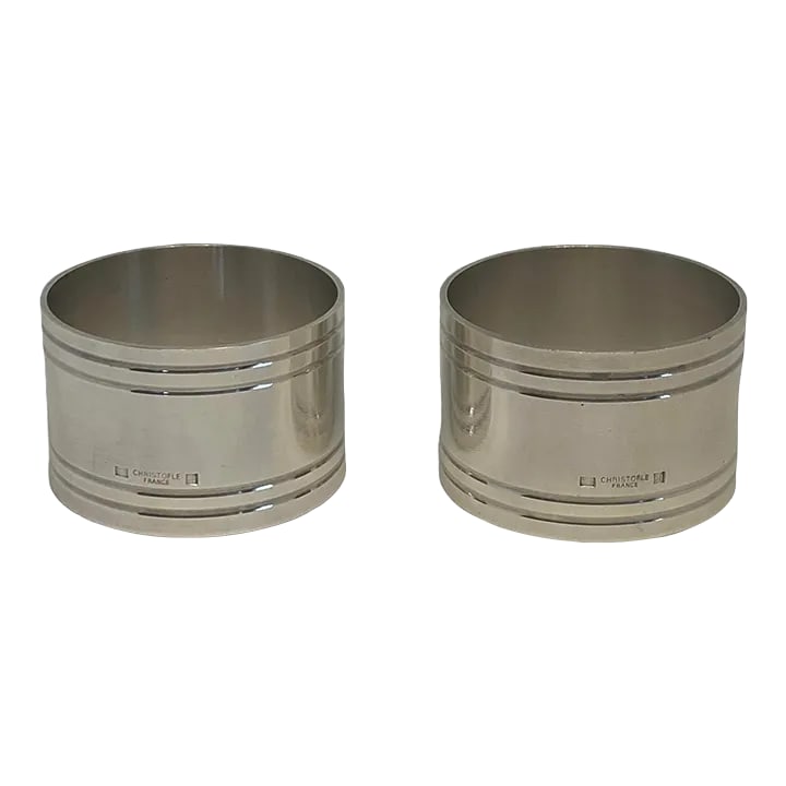 Late 20th Century Christofle Nathalie Silver-Plated Napkin Rings - Set of 2: Late 20th Century Christofle Nathalie Silver-Plated Napkin Rings - Set of Two. The silver-plated napkin rings from the Nathalie collection make an ideal baby shower or christening gift. These future