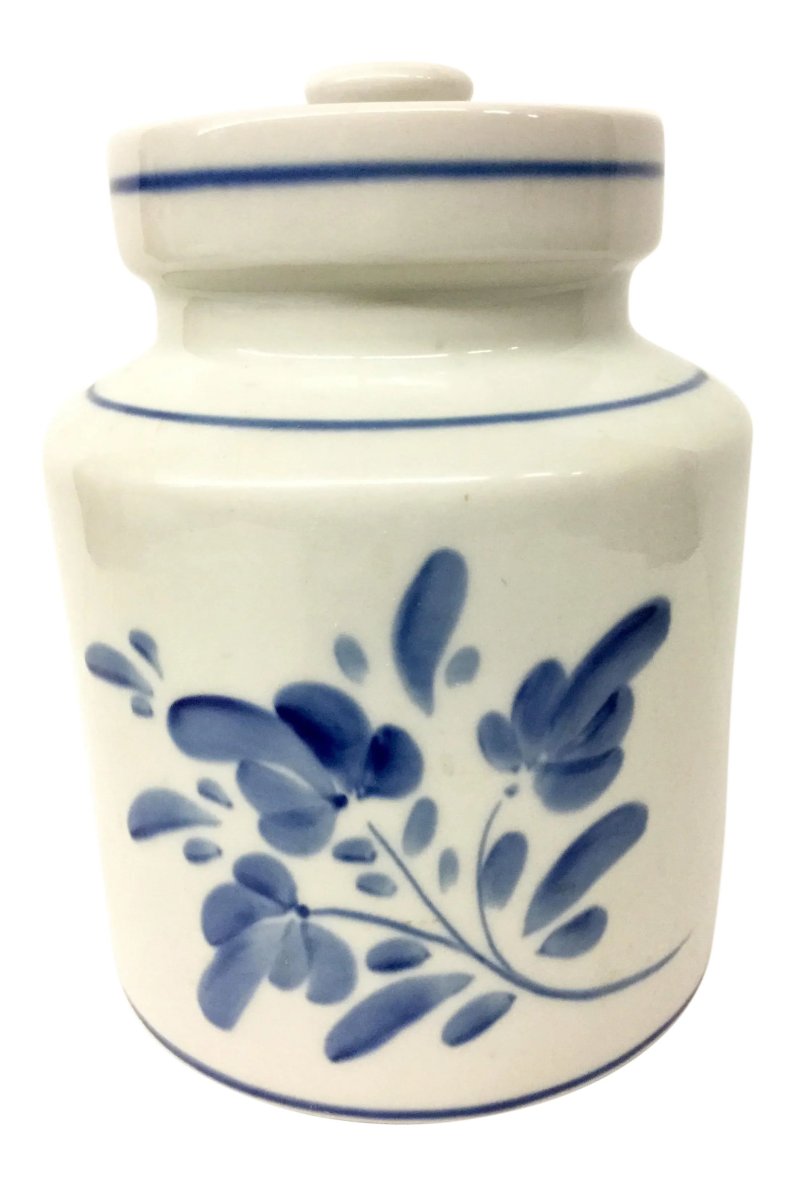 1980s Mediterranean Blue and White Cookie Jar: A beautiful cookie jar with heavy lid to hold your favorite goodies. Hand painted in Portugal by an artisan and obviously he or she loves the beauty of blue and white. The Hand Painted floral design