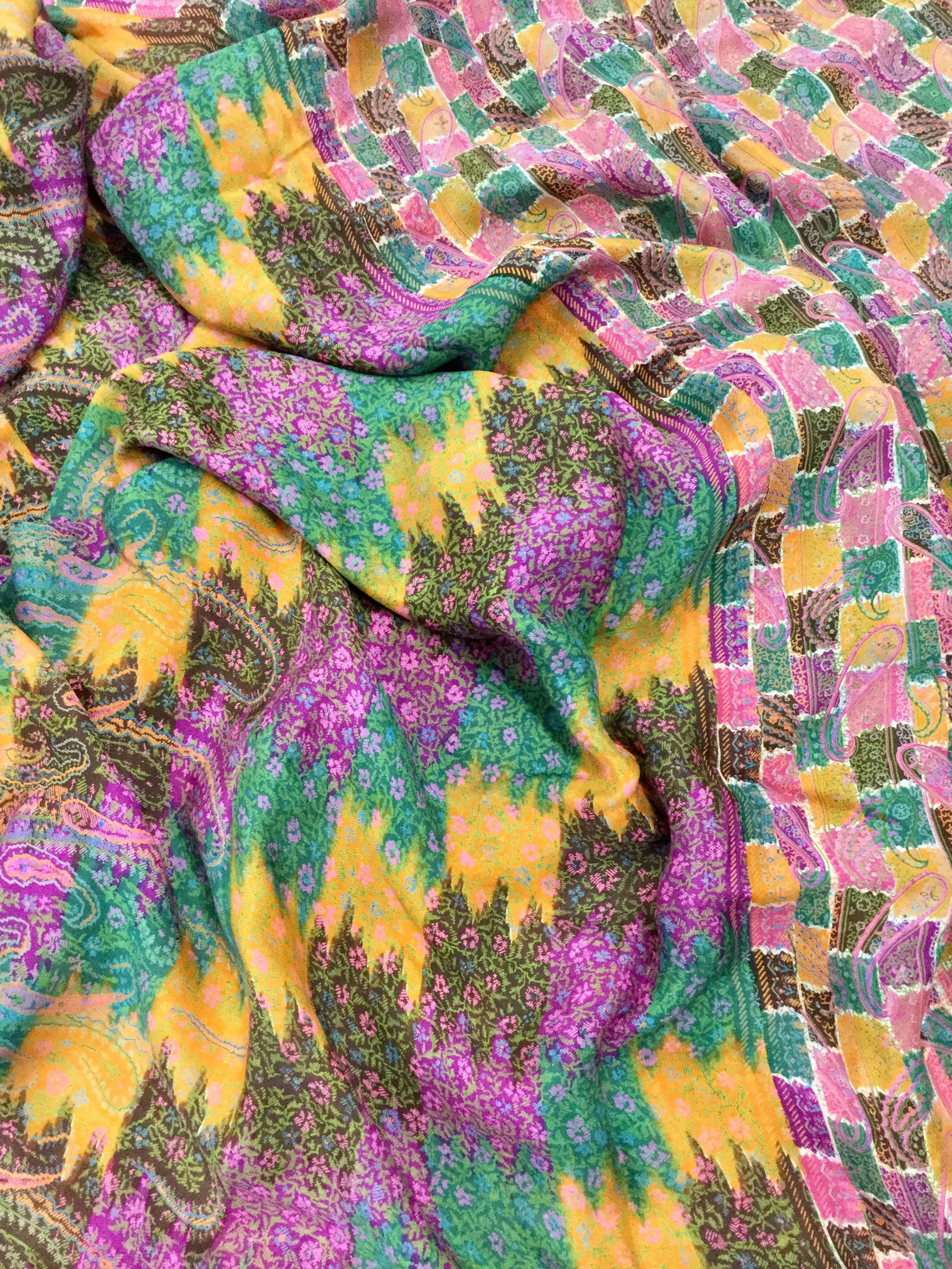 Paisley Print Vintage Silk / Viscose Indian Sari: Gorgeous print on this Vintage Sari. The border is a neon pink which transitions to a large paisley design which again transitions to a smaller design. The smaller design is the majority of the fabric