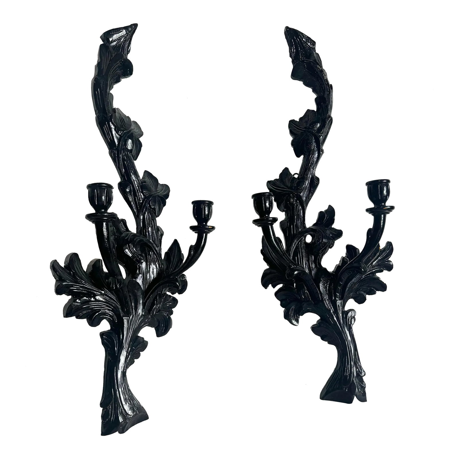 Vintage Hand Carved Black Wooden Candle Sconces - a Pair: Elevate your space with this stunning pair of vintage hand-carved black wooden candle sconces. Each sconce features intricate floral and foliage details, beautifully capturing classic design elements