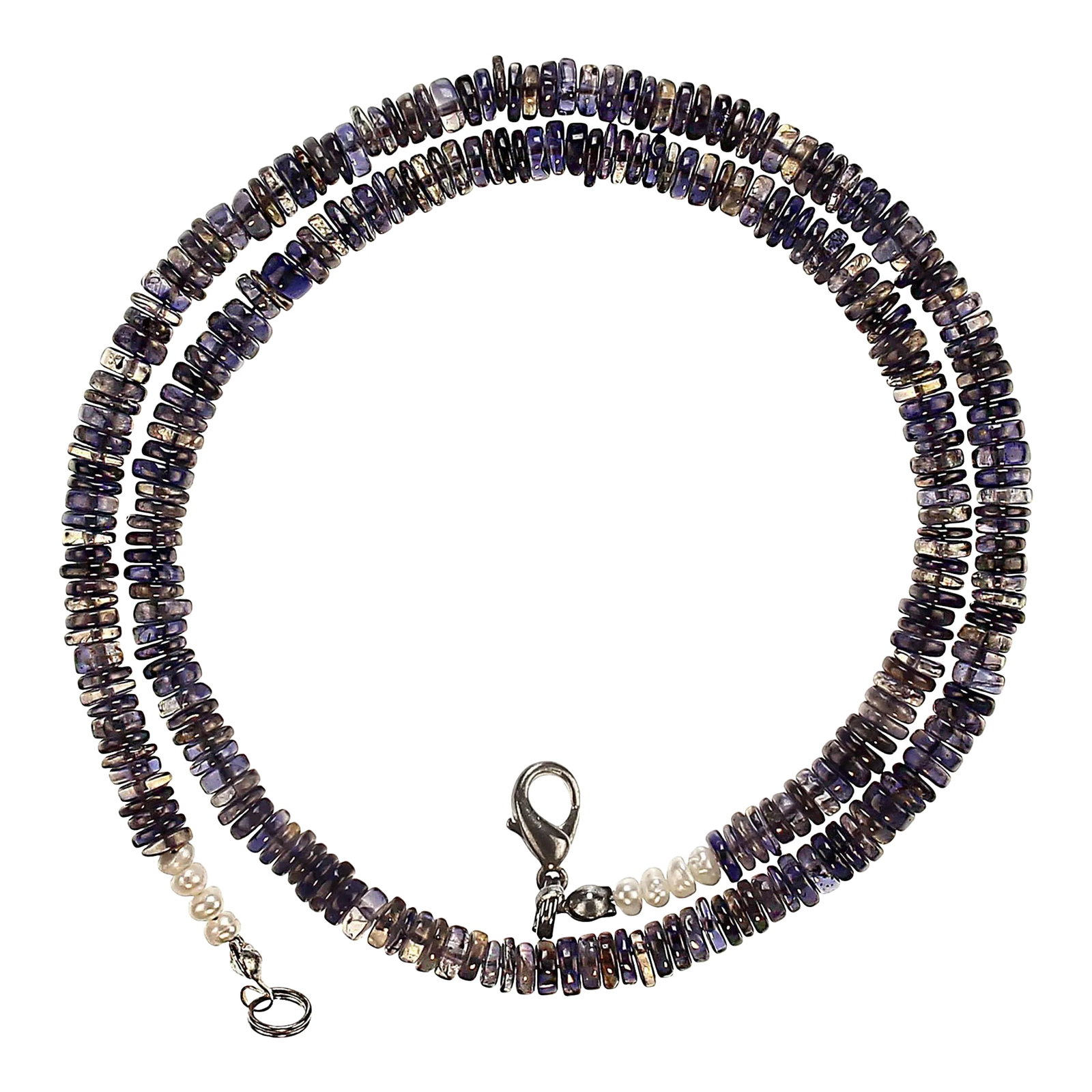 Ajd 18 Inch Blue Iolite Necklace: This is part of Chairish's Costume Jewelry assortment. 18 Inches of lovely blue Iolite. Iolite is a trichroic gemstone which means that is will present itself in three different colors depending on