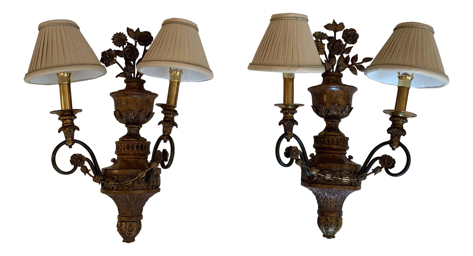Maitland Smith Floral Motif Brass Sconces - a Pair: Impressive and large pair of urn motife brass sconces having lovely bunches of flowers at the top, two arms and custom pleated silk shades. Measures: 12.5" W 17.5 W with shades. Condition:
