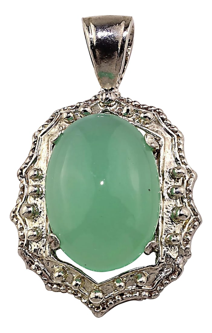 Glowing Translucent Cabochon Chrysophrase in Sterling Silver Pendant: Elevate Your Style with a Radiant Chrysoprase Sterling Silver Pendant Experience the timeless beauty of a warm, glowing Chrysoprase elegantly set in a detailed, high-quality Sterling Silver pendant.