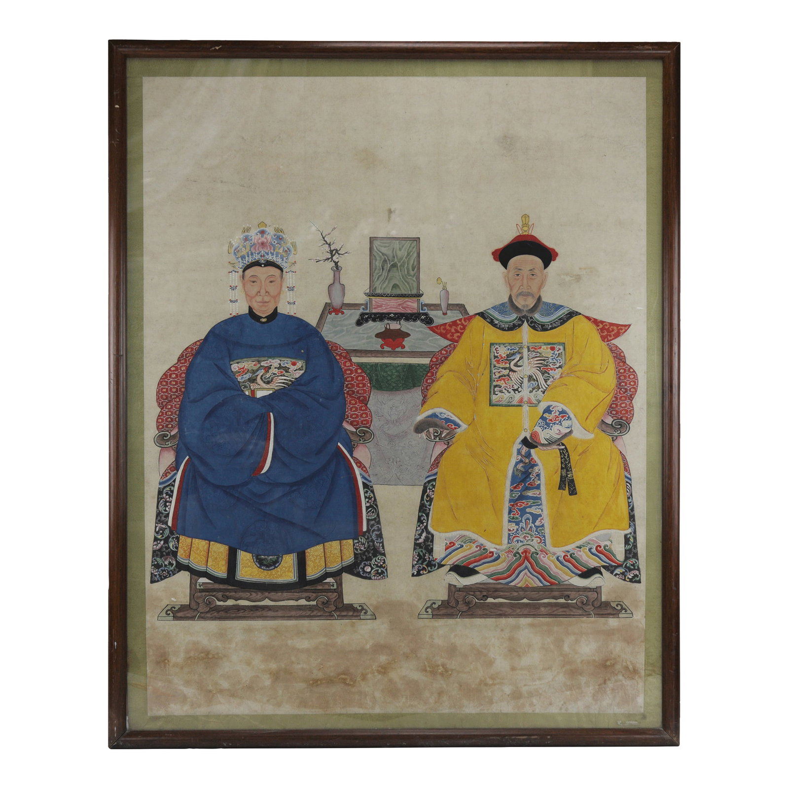Large Framed Mid-Qing Dynasty Chinese Meticulous Ancestor Portraits Painting: This exquisite large-scale painting from the Mid-Qing Dynasty depicts a high-ranking civil official and his wife. The seated nobleman is adorned in a fine bright yellow silk robe, highlighted by a