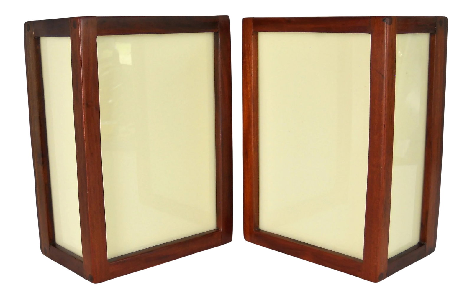Mid-Century African Teak Sconces, Pair: Vintage Mid-Century hand-crafted African Teak wall sconces, pair. Newly rewired for US with pull-chain switch. Drilled holes on back allow for mounting. Dimensions: 10"W x 6.5"D x 13.75"H. Condition: 