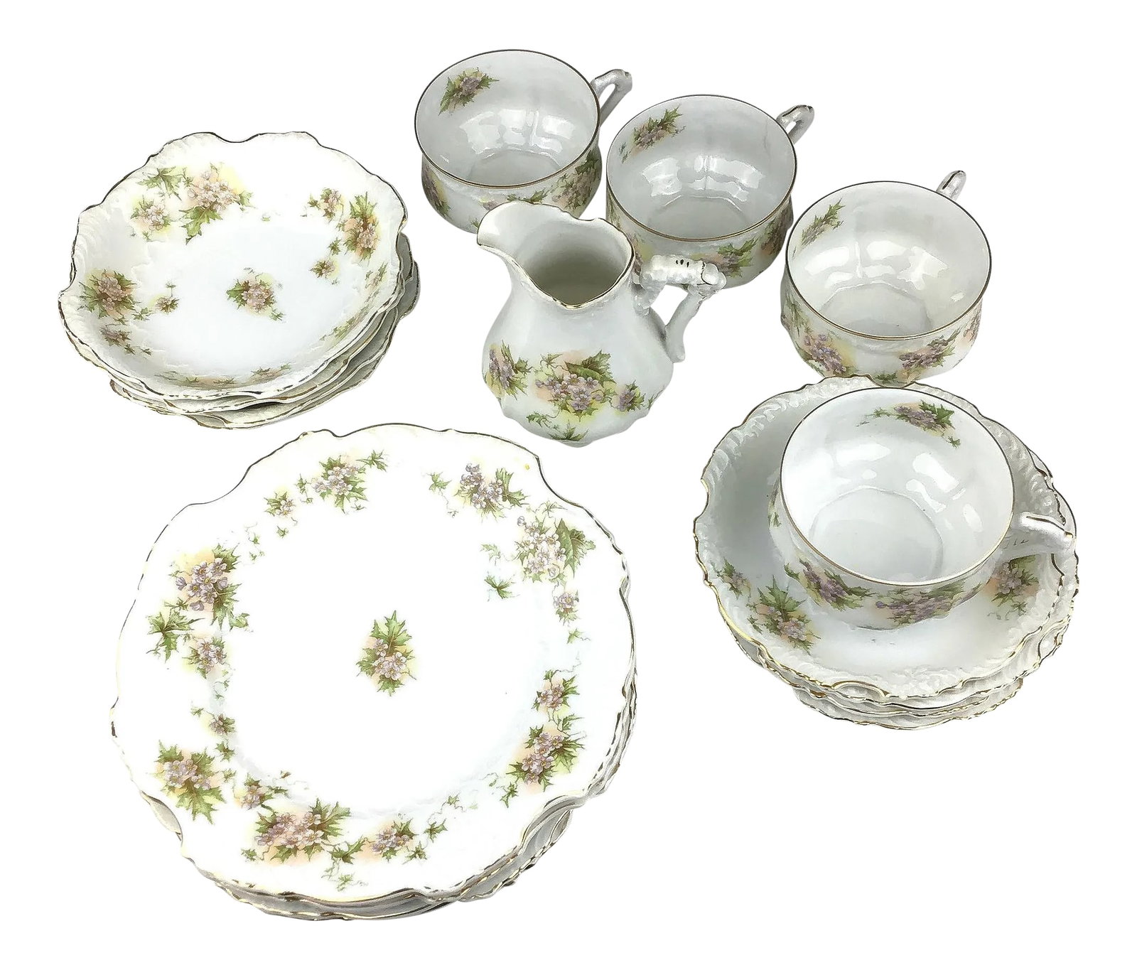Vintage Porcelain German Luncheon Set: Very intricate design and pattern. Gold edges on every piece. These dishes are in perfect condition. No cracks, misfires or chips. The set comes with 4 cups, 4 saucers, 4 plates and 4 bowls. Oh and a
