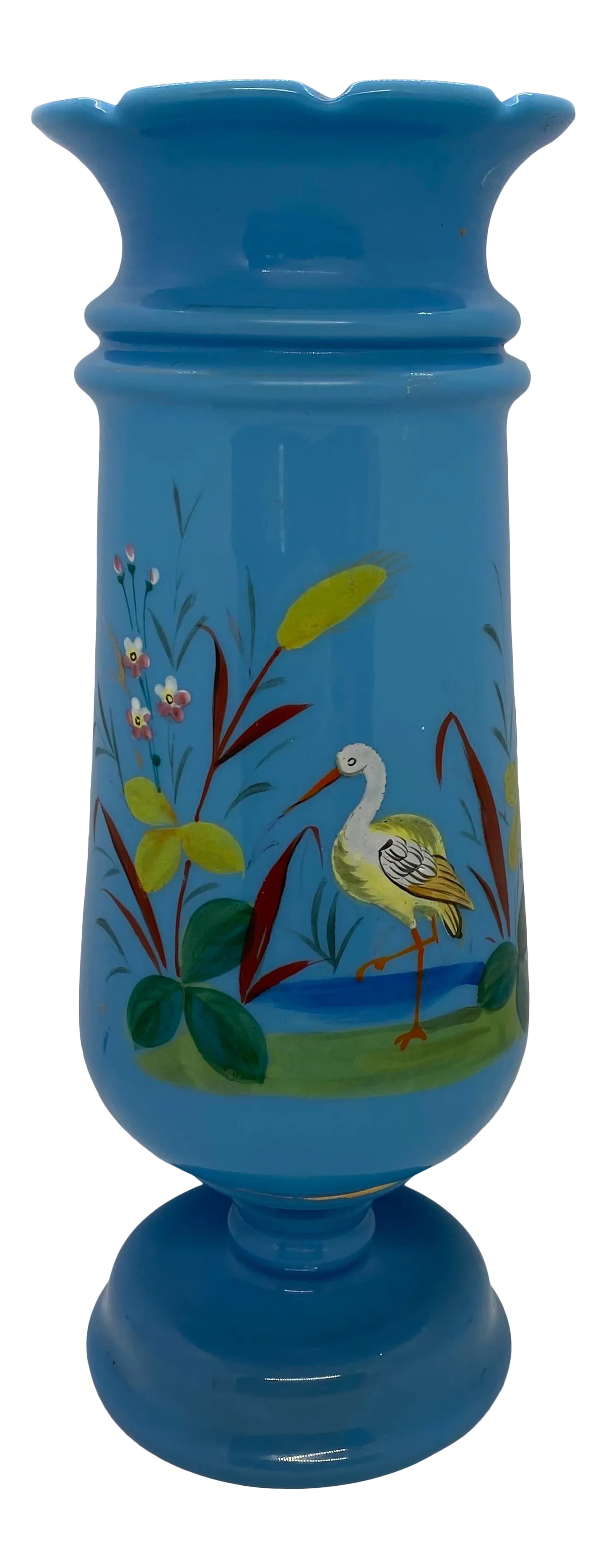 Late 19th Century Victorian Bristol Blue Glass Hand Painted and Enameled Vase: Beautiful antique hand-blown Bristol Blue glass vase with a featured Pelican in its domain. The flowers are enameled. It dates to around 1890. The Vase has blues, yellows, reds, whites, and greens.