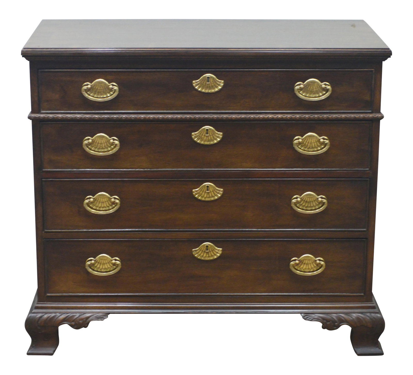 Henredon Banded Bachelor Chest of Drawers: Mahogany Chest by Henredon. It features a banded top, four dovetailed drawers and carved feet. Condition: Alterations: Original Condition Unaltered Imperfections: Some Imperfections Condition Notes: