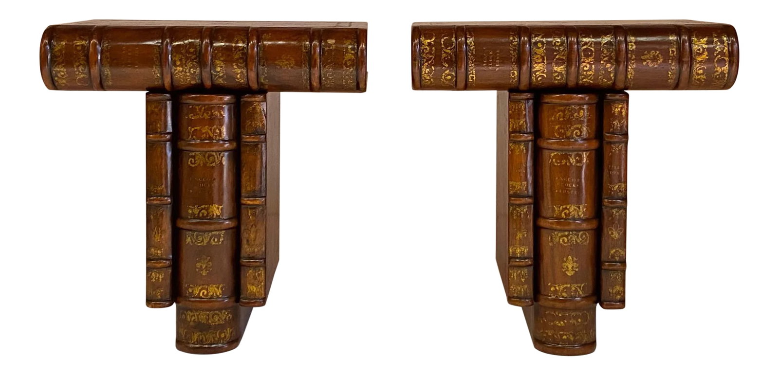 Vintage Theodore Alexander Trompe l'Oeil Book Brackets -Pair: An unusual pair of carved wood faux leather book brackets having embossed gold decoration. Condition: Alterations: Original Condition Unaltered Imperfections: Some Imperfections Condition Notes: