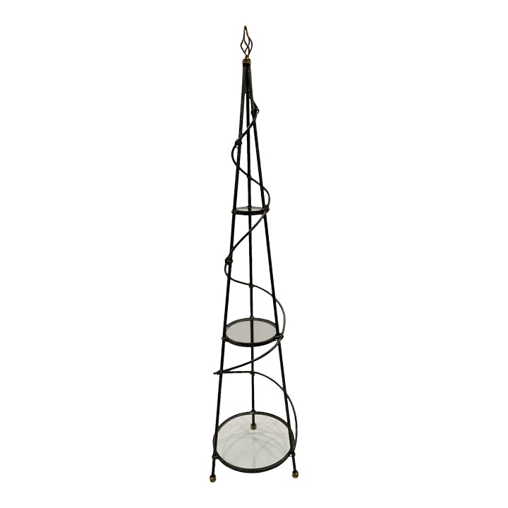 Maitland Smith 3 Tier Spiral Iron & Glass Etagere Shelves: A sculptural 3 tier iron free standing etagere having grey metal structure with handsome brass details and spiral motife. The circular spiral shape is graduated with bottom tier 17" diameter, middle