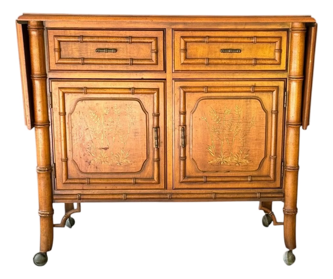 Vintage Mid-Century Dixie "Aloha" Faux Bamboo Drop-Leaf Buffet Server & Bar Cart: Bring iconic Palm Beach style to your home with this classic 1960s Dixie Furniture "Aloha" collection server. Brimming with Hollywood Regency and Chinoiserie charm, this versatile bar and buffet cart