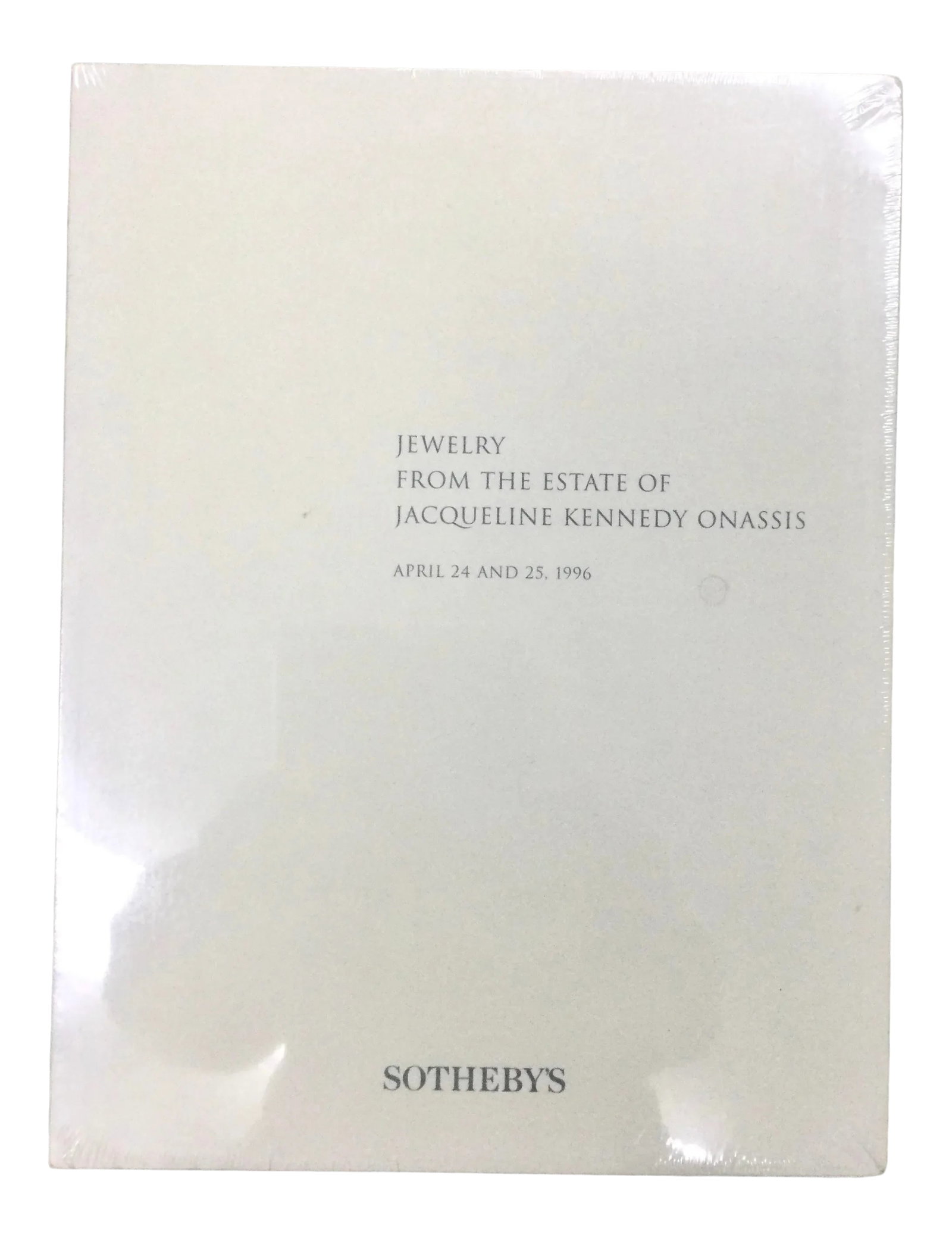 Auction Catalogue Jewelry From the Estate of Jacqueline Kennedy Onassis April 24th & 25th 1996: New, never opened Sotheby's catalog showing the jewelry of Jacqueline Kennedy Onassis that was auctioned off on April 24th and 25th, 1996. The catalog is 196 pages and is in a new plastic-wrapped