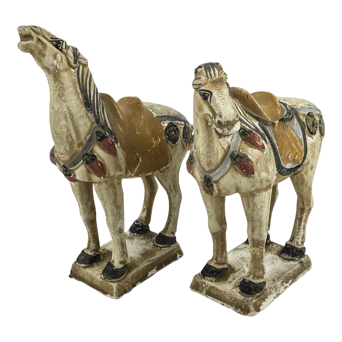 Miniature Antique Pair of Terra Cotta Tang Horses: In ancient China, terracotta statues were made to accompany and protect emperors and personalities in the afterlife. The horse was very important as it was the one that allowed the deceased to be