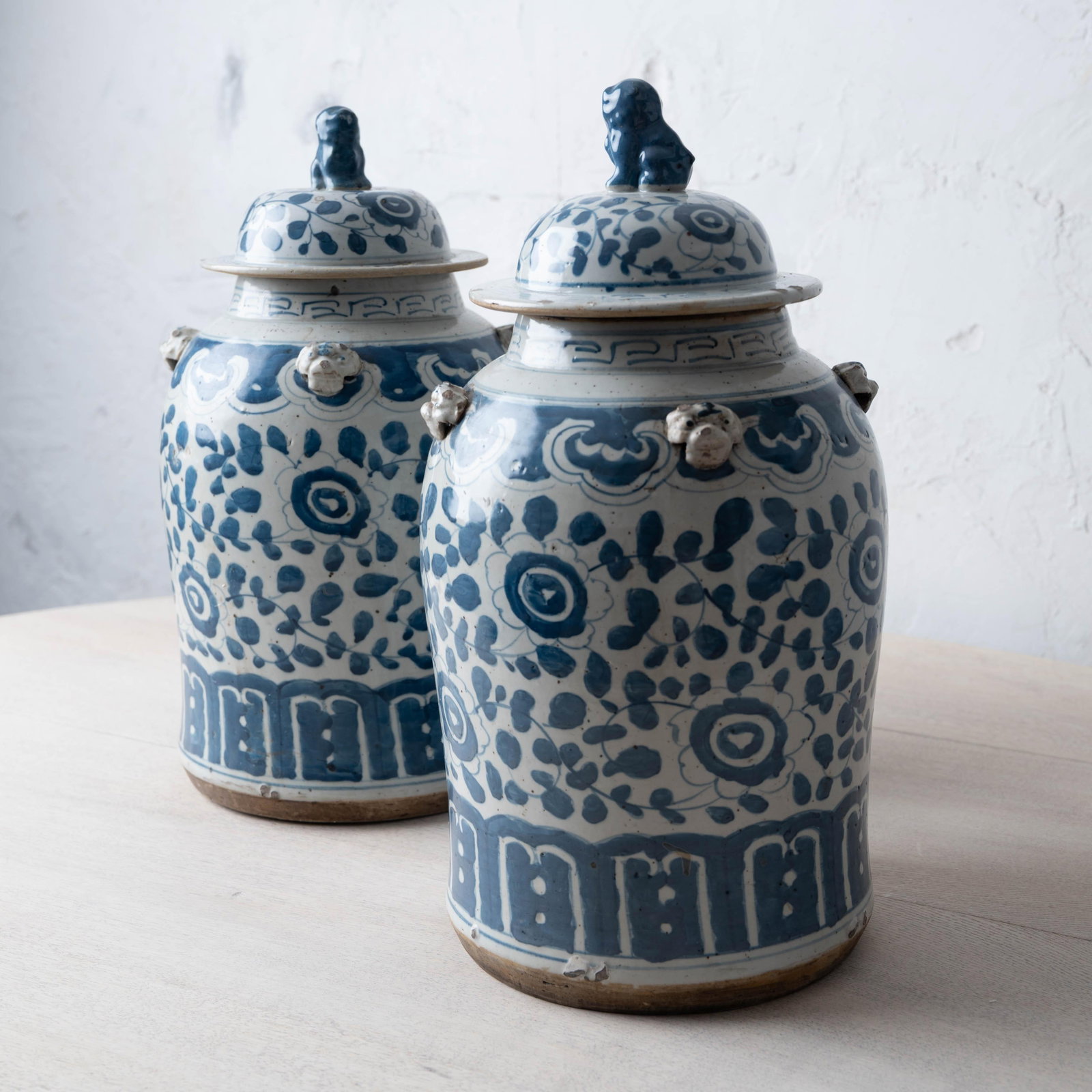 Pair of Chinese Blue and White Glazed Jars With Foo Dog Finials - 2