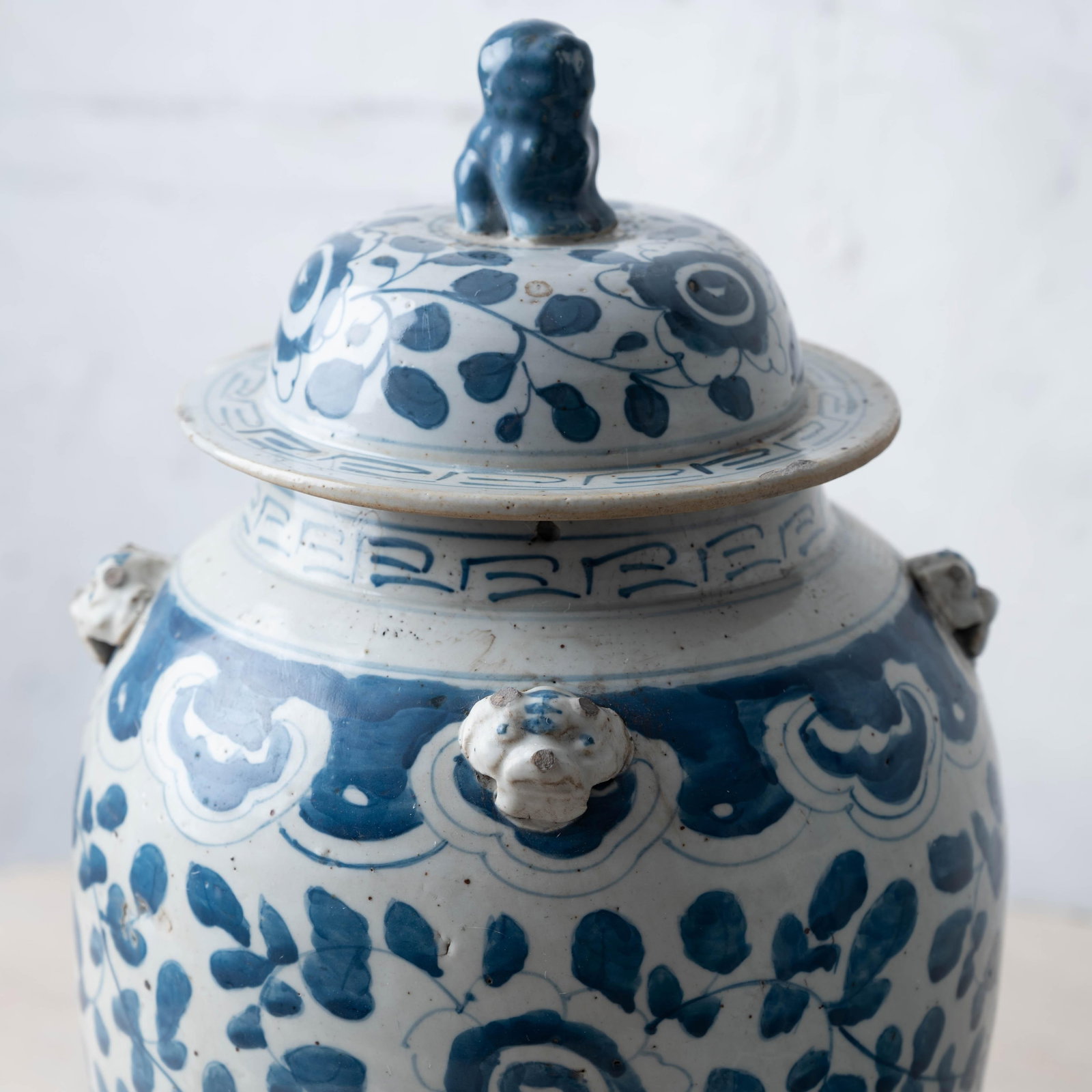 Pair of Chinese Blue and White Glazed Jars With Foo Dog Finials - 6