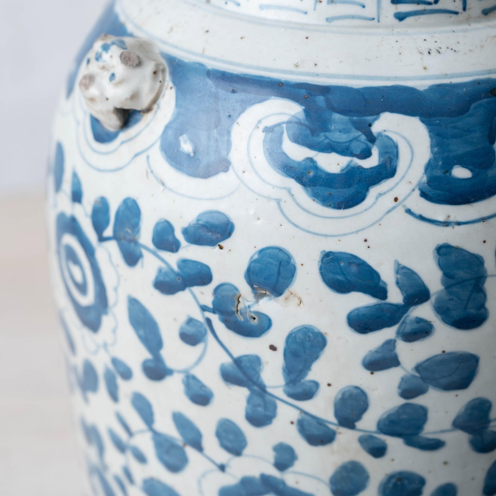 Pair of Chinese Blue and White Glazed Jars With Foo Dog Finials - 8