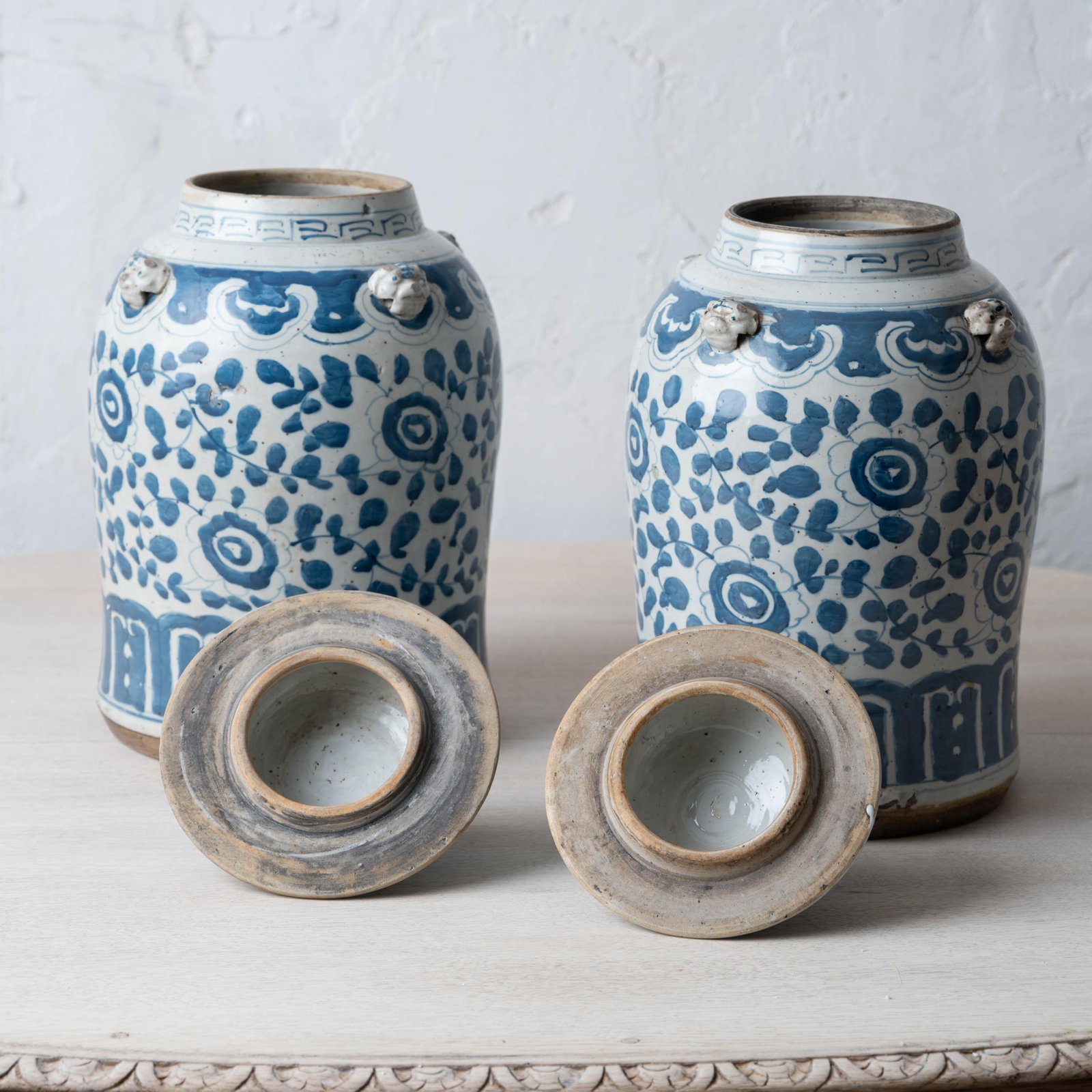 Pair of Chinese Blue and White Glazed Jars With Foo Dog Finials - 9