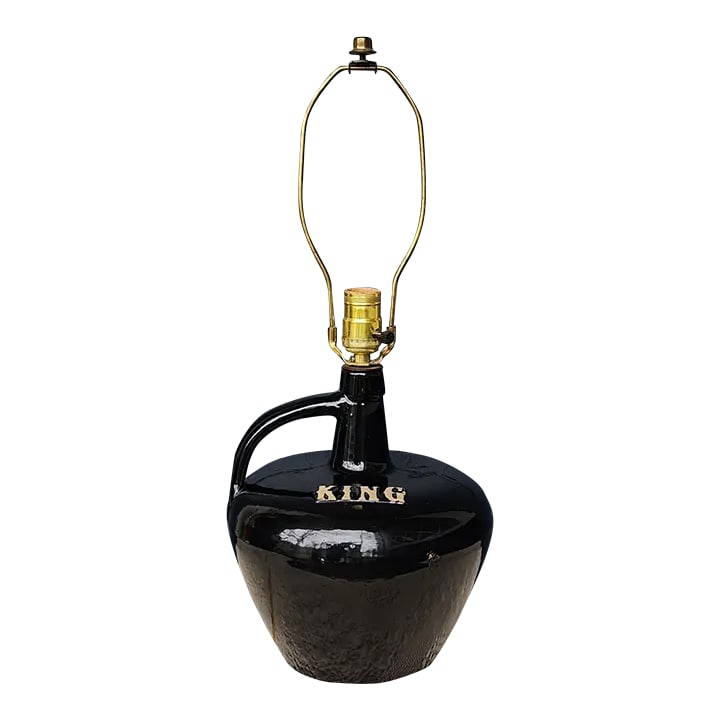 Vintage Mid-Century King Whiskey Jug Lamp: Vintage King whiskey jug lamp. Shiny ebony black glaze with tan "KING" lettering. Three way socket and original wiring. Condition: Alterations: Original Condition Unaltered Imperfections: Some