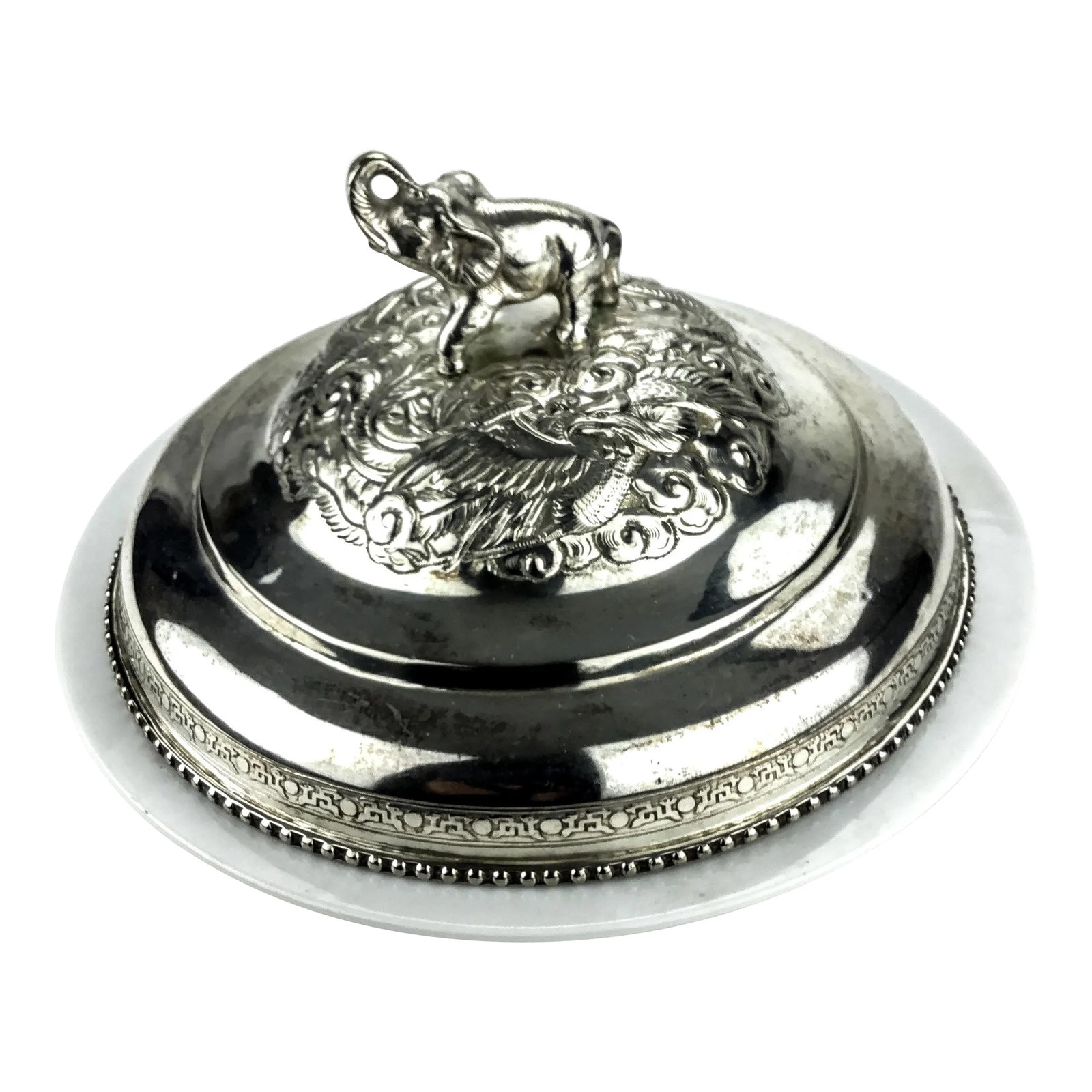 Silver Plate Heavy Elephant Lid With White Porcelain Serving Dish: Gorgeous carved vintage Elephant cover made from Silver Plate and hand made in Asia. This piece has been lovingly cared for and is ready to show off the curves and details. We added a simple white por
