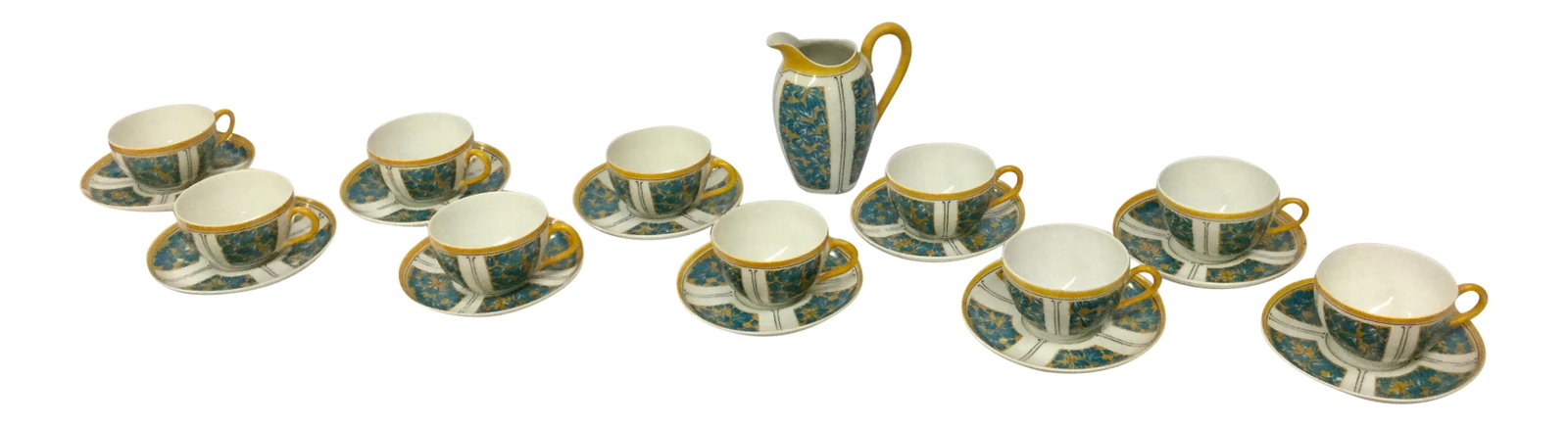 E. Dumas Limoges France Teacups & Milk Pitcher - Service for 10: From the late 1800's. This set of 10 cups and saucers plus a bonus milk pitcher is in near perfect condition. Only one cup and one saucer shows a tiny chip. Amazing. This set is delicate and unique.