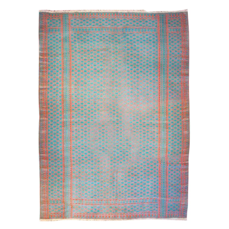 Early 20th Century Saveh Kilim Rug - 70" x 108": An early 20th century Persian Savek Kilim rug, woven with naturally dyed cotton, with a beautiful all-over field of small-scale orange or red flowers on an wonderful turquoise background flanked by a