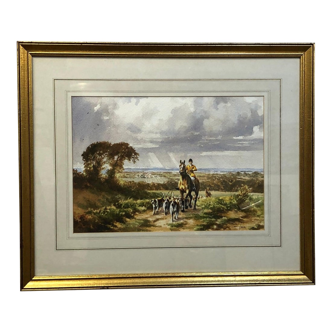 "Fox Hunt" - Mid 20th Century Original Watercolor Signed, Framed: This evocative original watercolor captures a quintessential moment of equestrian tradition - a fox hunt in the English countryside. Executed in a realistic yet atmospheric style, the composition