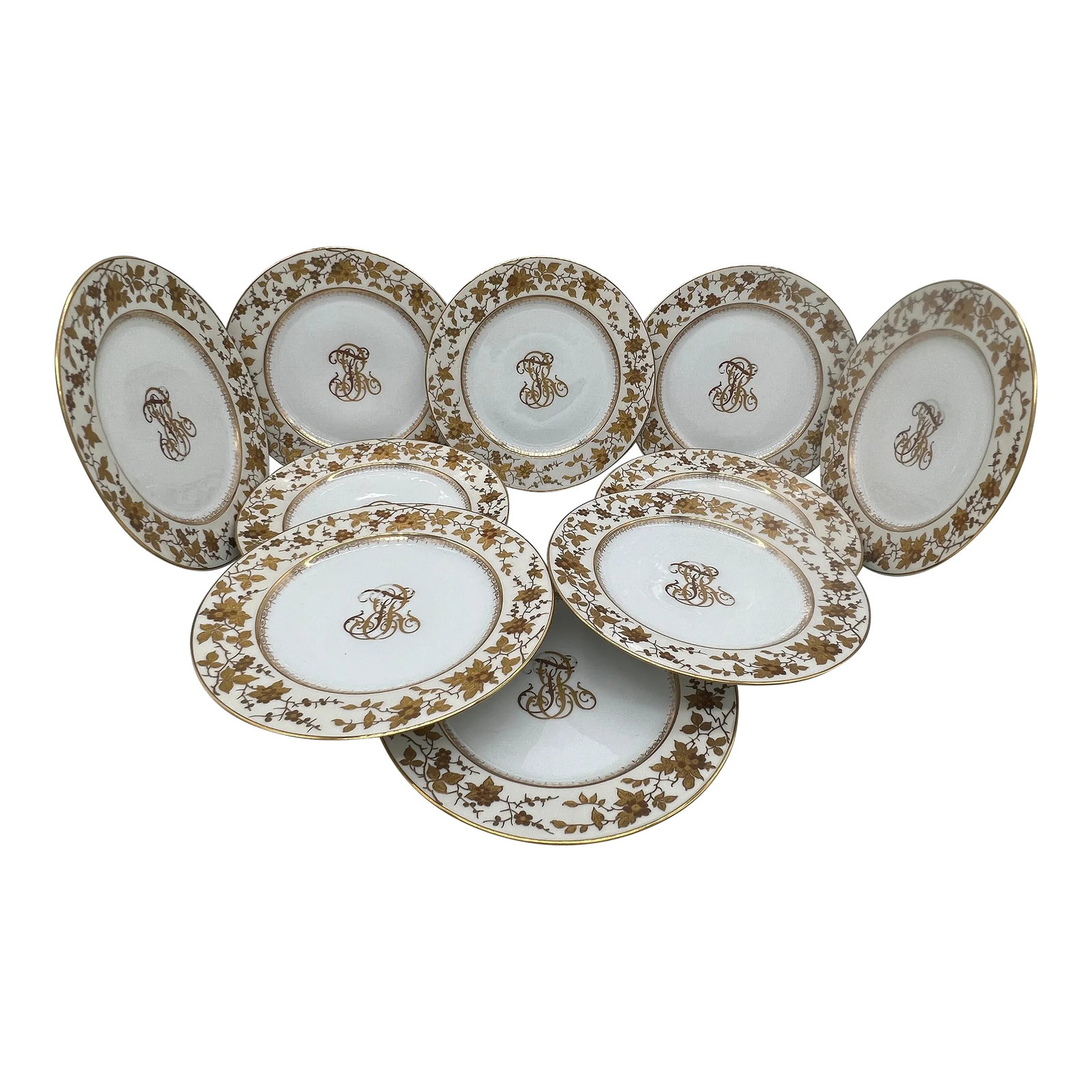 (10) Ten Fischer & Mieg Pirkenhammer Gilt Vine Encrusted Porcelain Dinner Plates: Fischer & Mieg Pirkenhammer (German, 19th century). A set of 10 stunning porcelain dinner plates. Each plate is overly decorated with daisy floral and vines to rim and a geometric form to inner