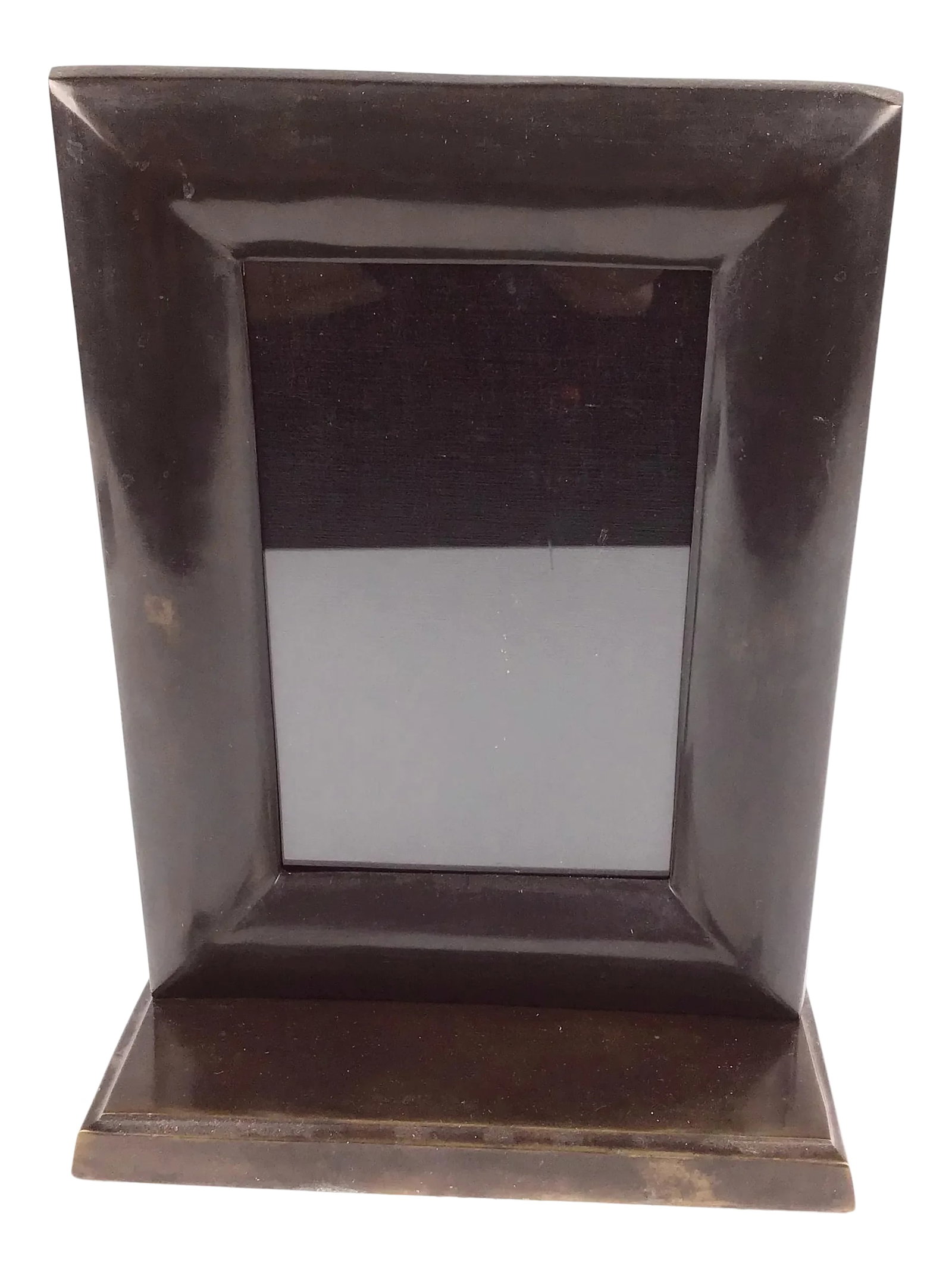 1920s Art Deco Era Hand Formed Solid Bronze Photo Frame: Very nice Art Deco modernist picture photo frame, featuring thick hand-rubbed solid bronze frame and stand. The frame is complete with its glass sheet to enclose the photograph. As shown, the back is