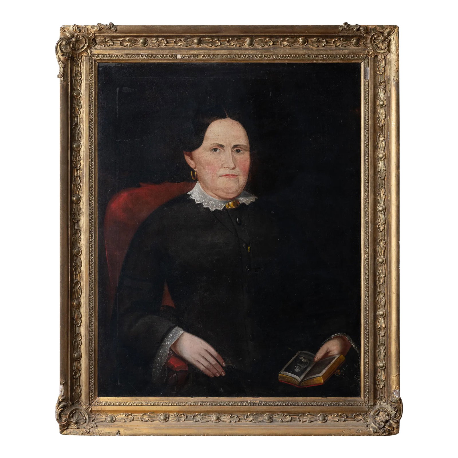 American School Portrait of a Lady, c.1840: An American school oil on canvas portrait of a lady with a book; the book opened to an image of another portrait. Verso with stenciled canvas supplier William Wisong of Baltimore and prepared by