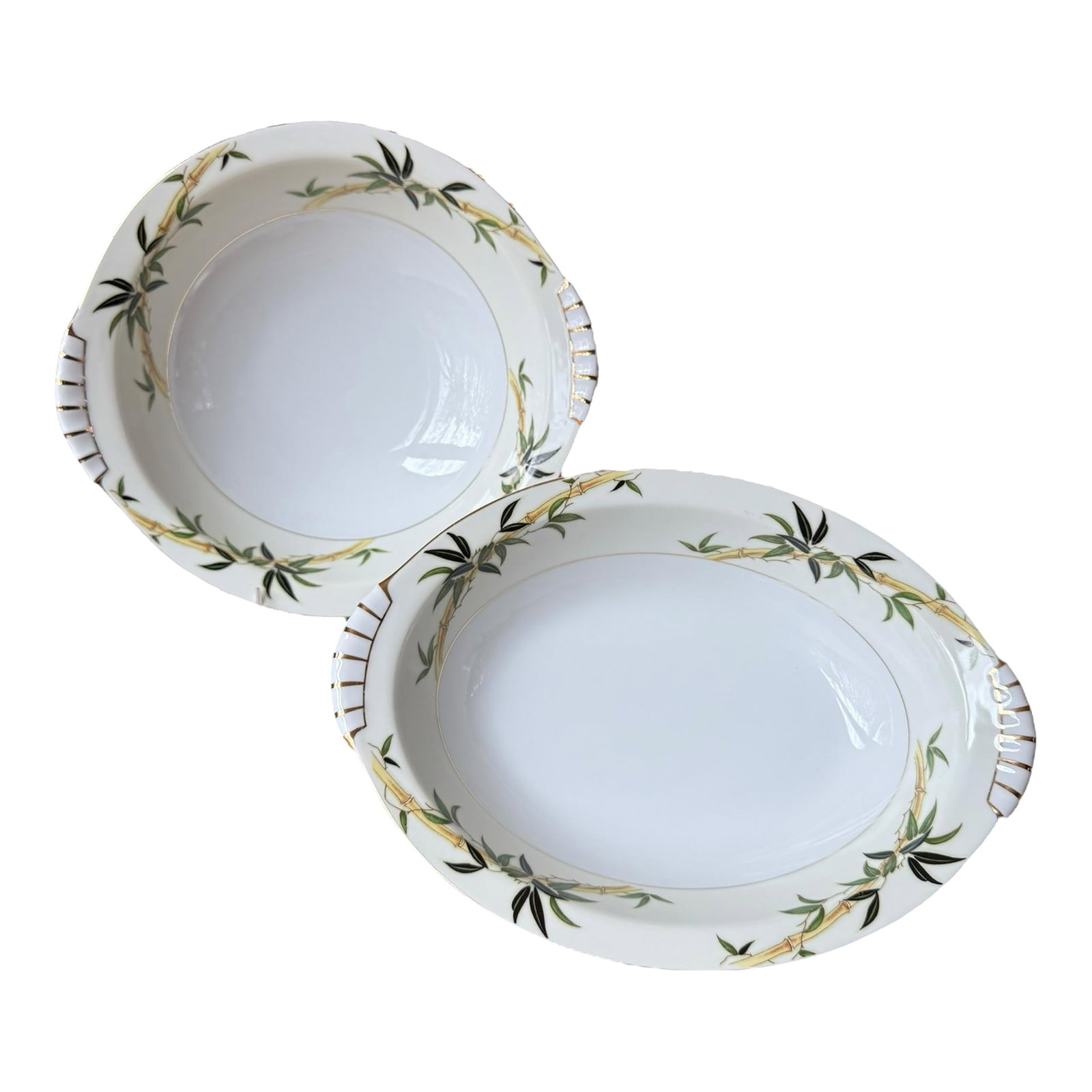 Vintage Bali Hai Bamboo Porcelain Serving Bowls by Narumi Japan - Set of 2: Offering a pair of "Bali Hai" serving bowls by Narumi, featuring a bamboo pattern with green leaves and gold accents. 11" oval with a 9" round serving bowl. This set shows minimal signs of use and