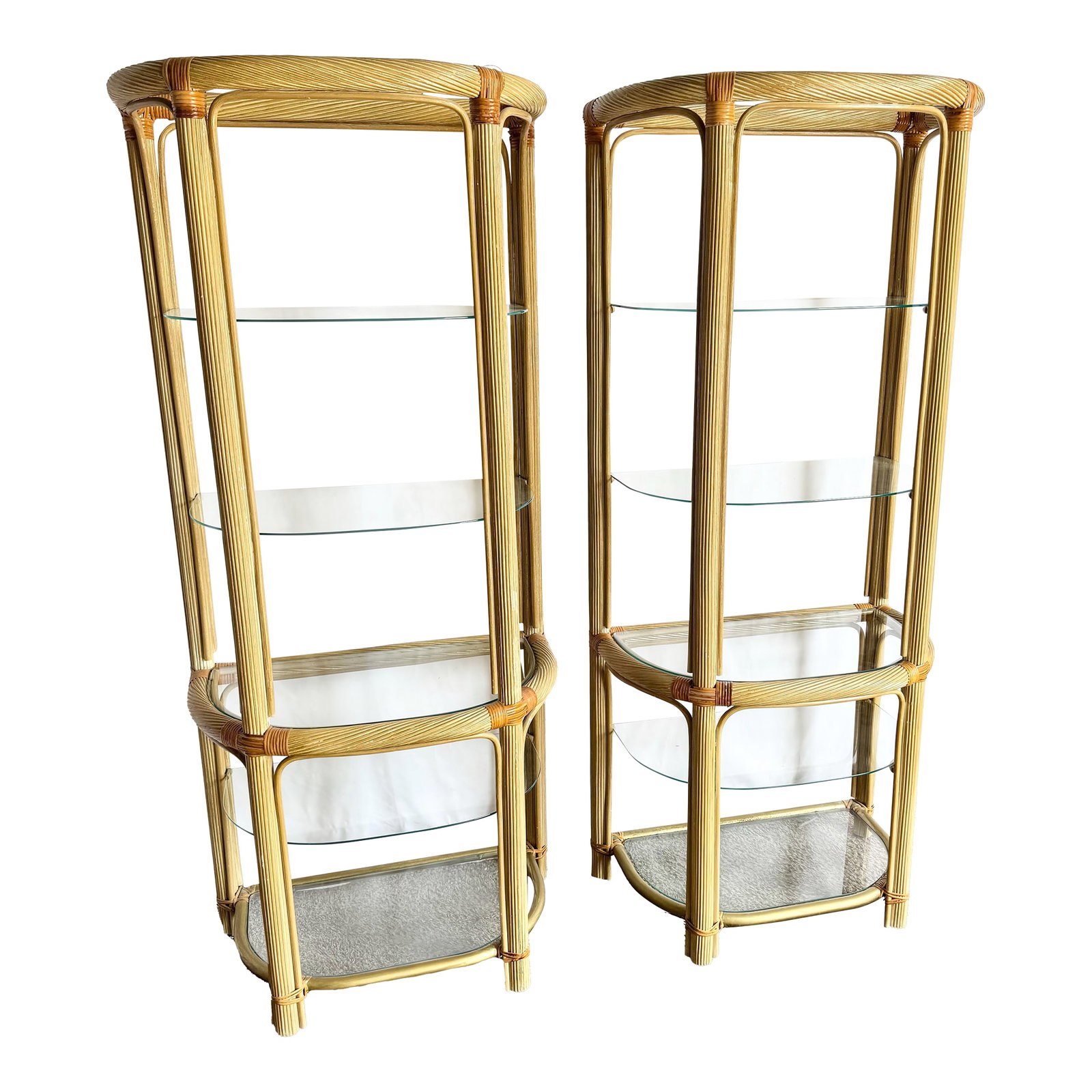 Boho Chic Pencil Reed Etageres - A Pair: Graceful and airy, this pair of boho chic pencil reed etageres embodies the relaxed sophistication of coastal design. Crafted with slender reed framing and warm natural tones, their sculptural