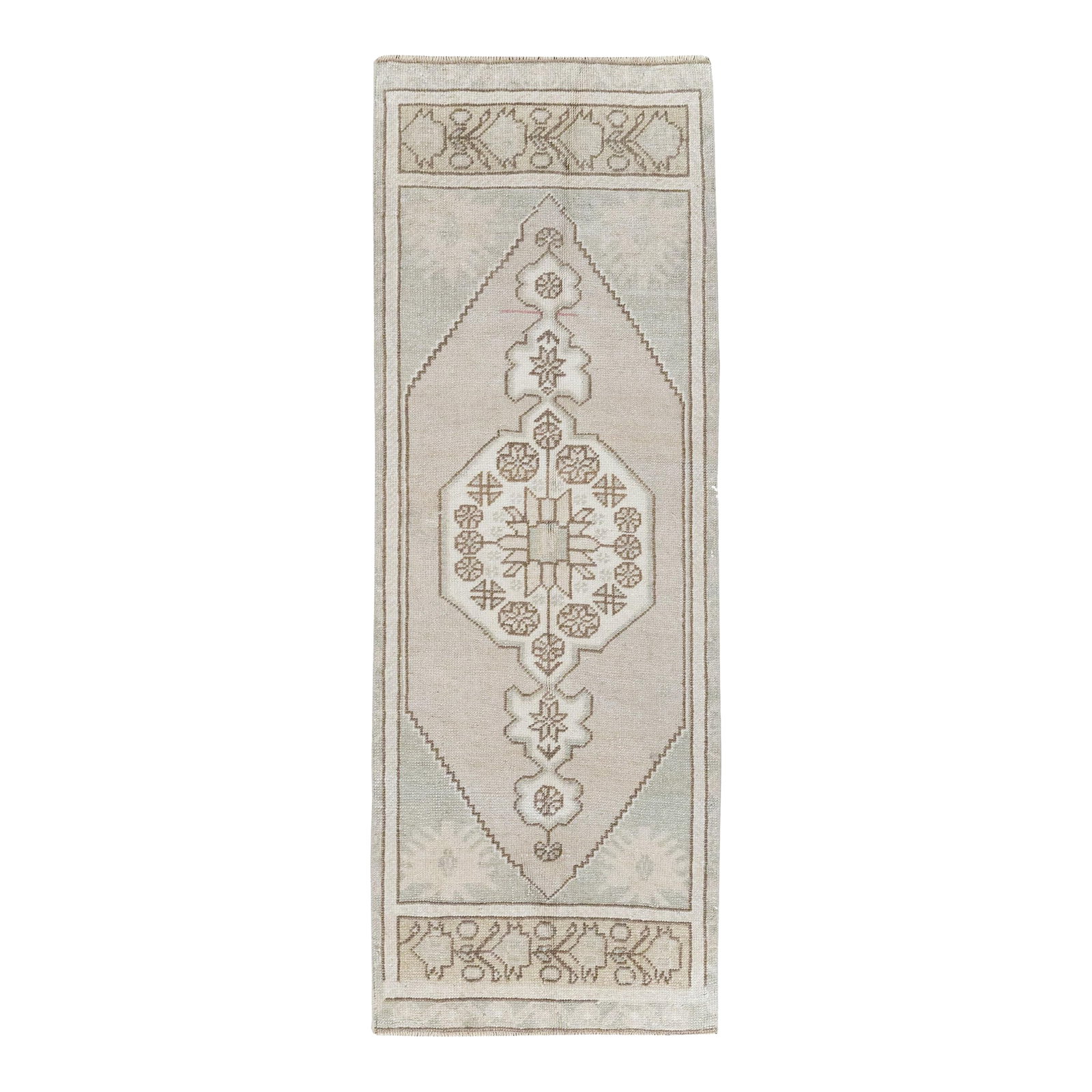 Galerie Shabab Collection Mid-20th Century Turkish Oushak Throw Rug: A wool pile of symmetric knots on a wool foundation. The soft, open, minutely stepped hexagonal beige field centrally hosts an octagonal medallion with double pendants. Plain triangular field