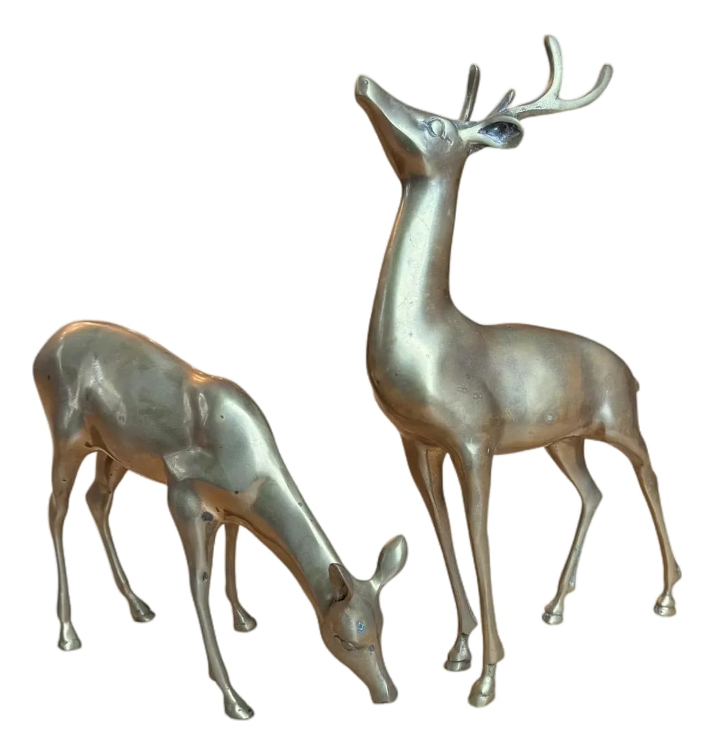 Large Vintage Patina Brass Pair Deer Buck Doe: These are large sized vintage brass deer figurines, a buck and doe pair. Solid brass.Original aged patina. See photos Mid-Century Modern/Hollywood Regency 14" H x 8" L x 3" W 8.5" H x 11" L x 3"W