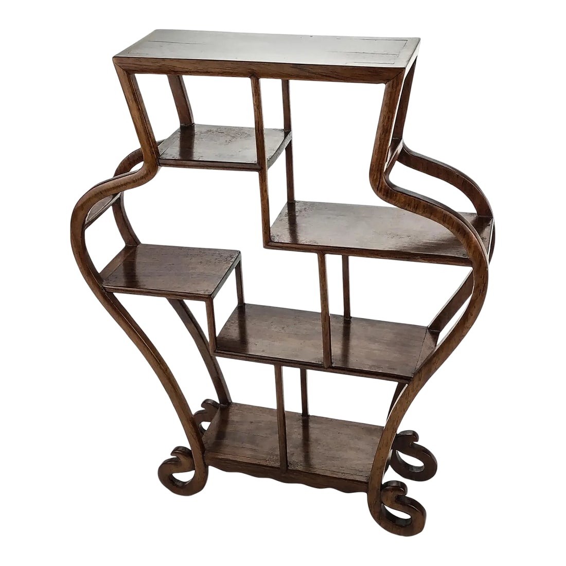 Tabletop Chinese Rosewood Etagere Display: Strong yet elegant hand carved rosewood curio shelf. Perfect to sit on a bookcase to display small objects of art. This piece also looks great without anything, just leave it naked these small hand