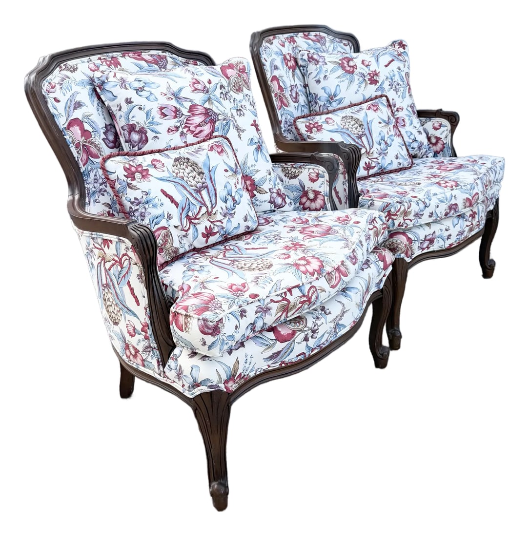 Vintage French Provincial Floral Upholstery Lounge Chairs - Pair: Gracefully blending French Provincial elegance with timeless botanical charm, this pair of vintage lounge chairs features beautifully carved hardwood frames with flowing cabriole legs, sculpted arms,